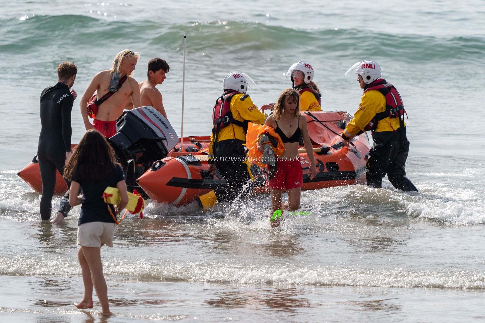 HM Coastguard helicopter is called to assist the local lifeguards and the RNLI on helping a person who had fallen on cliffs near Whitesands Beach, Pembrokeshire. The RNLI give the local lifeguards a lift back to the Whitesands Beach