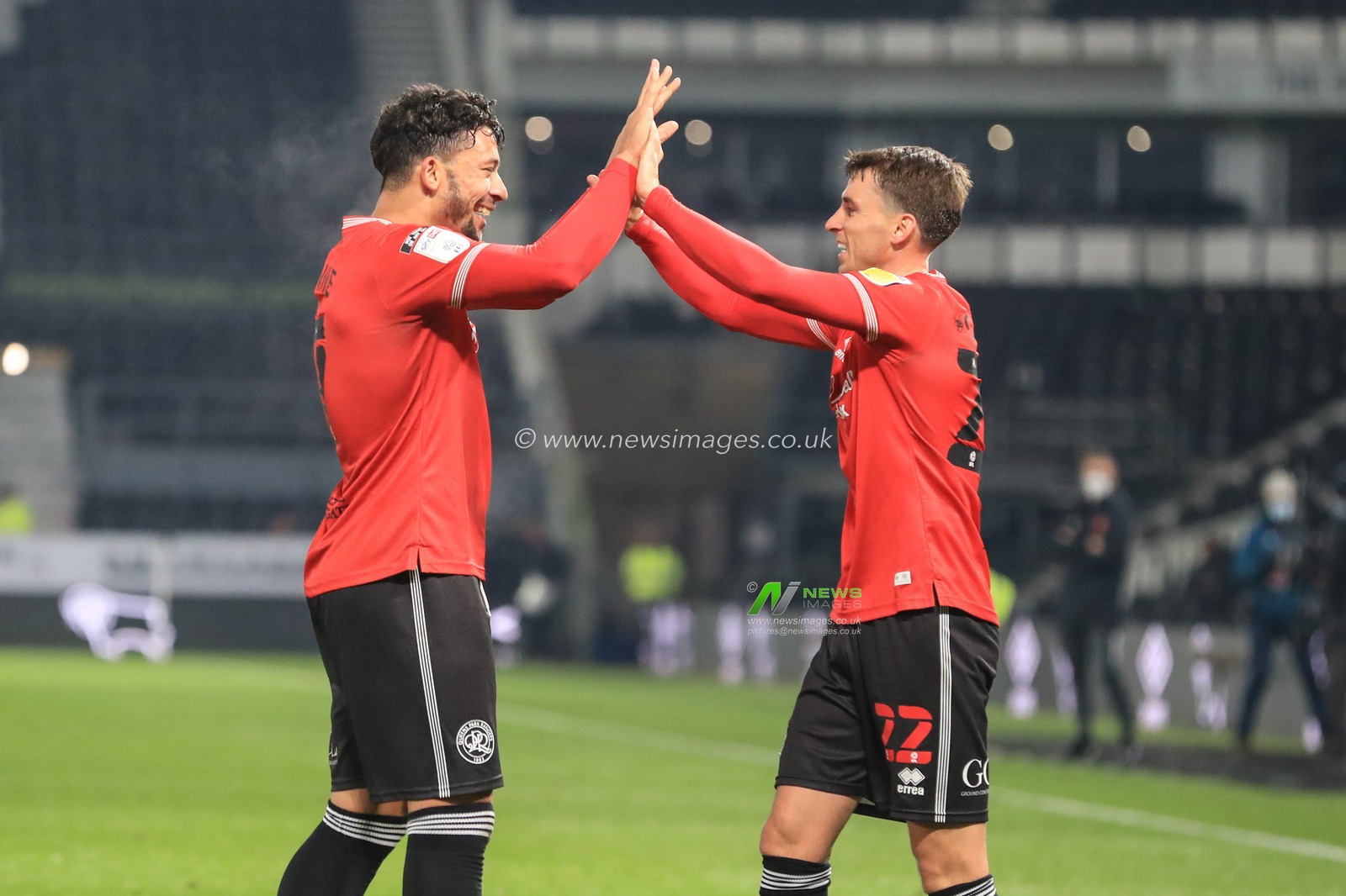 Macauley Bonne (7) of Queens Park Rangers and Tom Carroll (22) of Queens Park Rangers celebrate their 0-1 win over Derby County