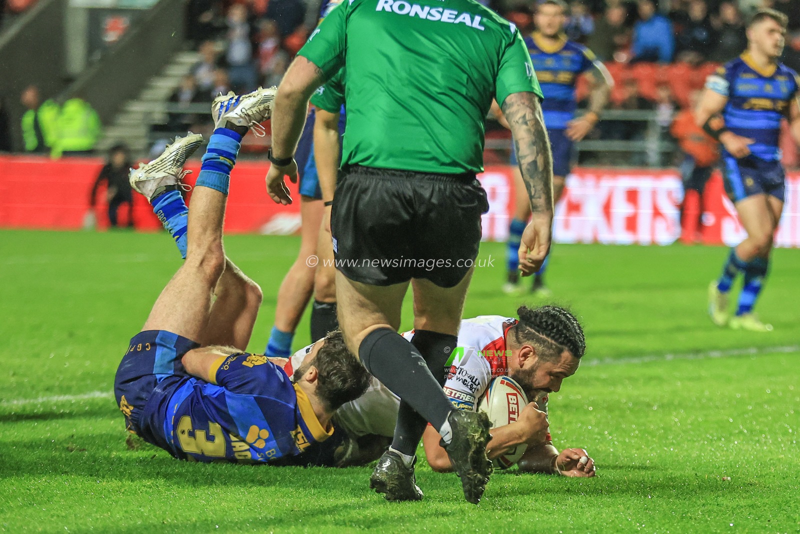 Konrad Hurrell #23 of St Helens goes over for a try during the Betfred Super League Round 7 match St Helens vs Wakefield Trinity at Totally Wicked Stadium, St Helens, United Kingdom, 31st March 2023

(Photo by Mark Cosgrove/News Images)