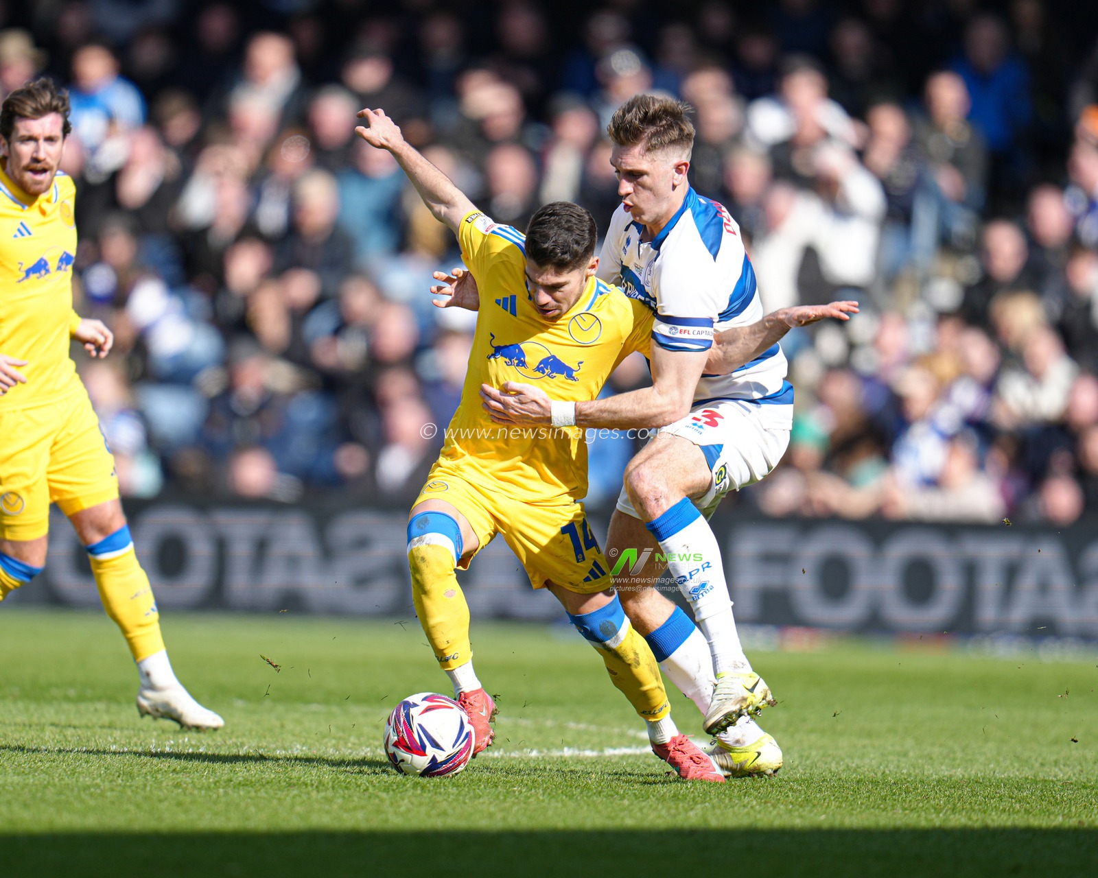Manor Solomon of Leeds United and Jimmy Dunne of Queens Park Rangers battle for the ball during the Sky Bet Championship match Queens Park Rangers vs Leeds United at Kiyan Prince Foundation Stadium, London, United Kingdom, 15th March 2025

(Photo by Harvey Murphy/News Images)