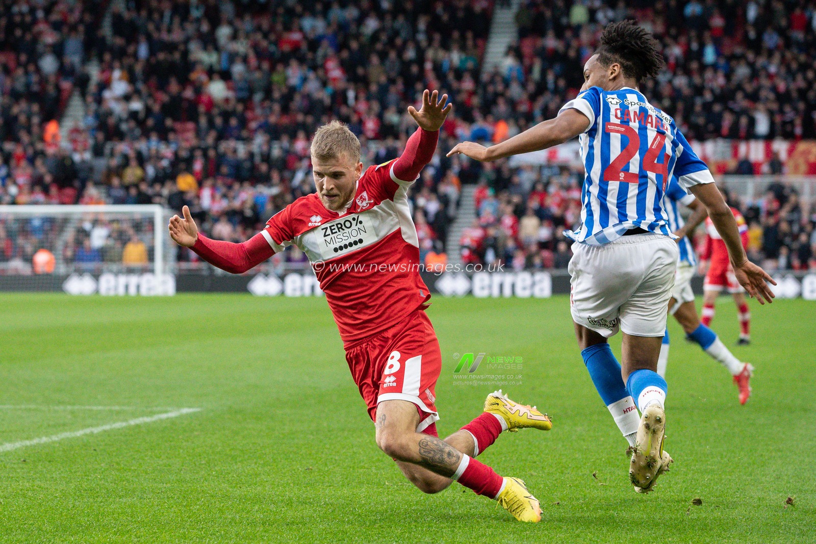 Riley McGree #8 of Middlesbrough is brought down by Etienne Camara #24 of Huddersfield Town during the Sky Bet Championship match Middlesbrough vs Huddersfield Town at Riverside Stadium, Middlesbrough, United Kingdom, 22nd October 2022

(Photo by James Heaton/News Images)