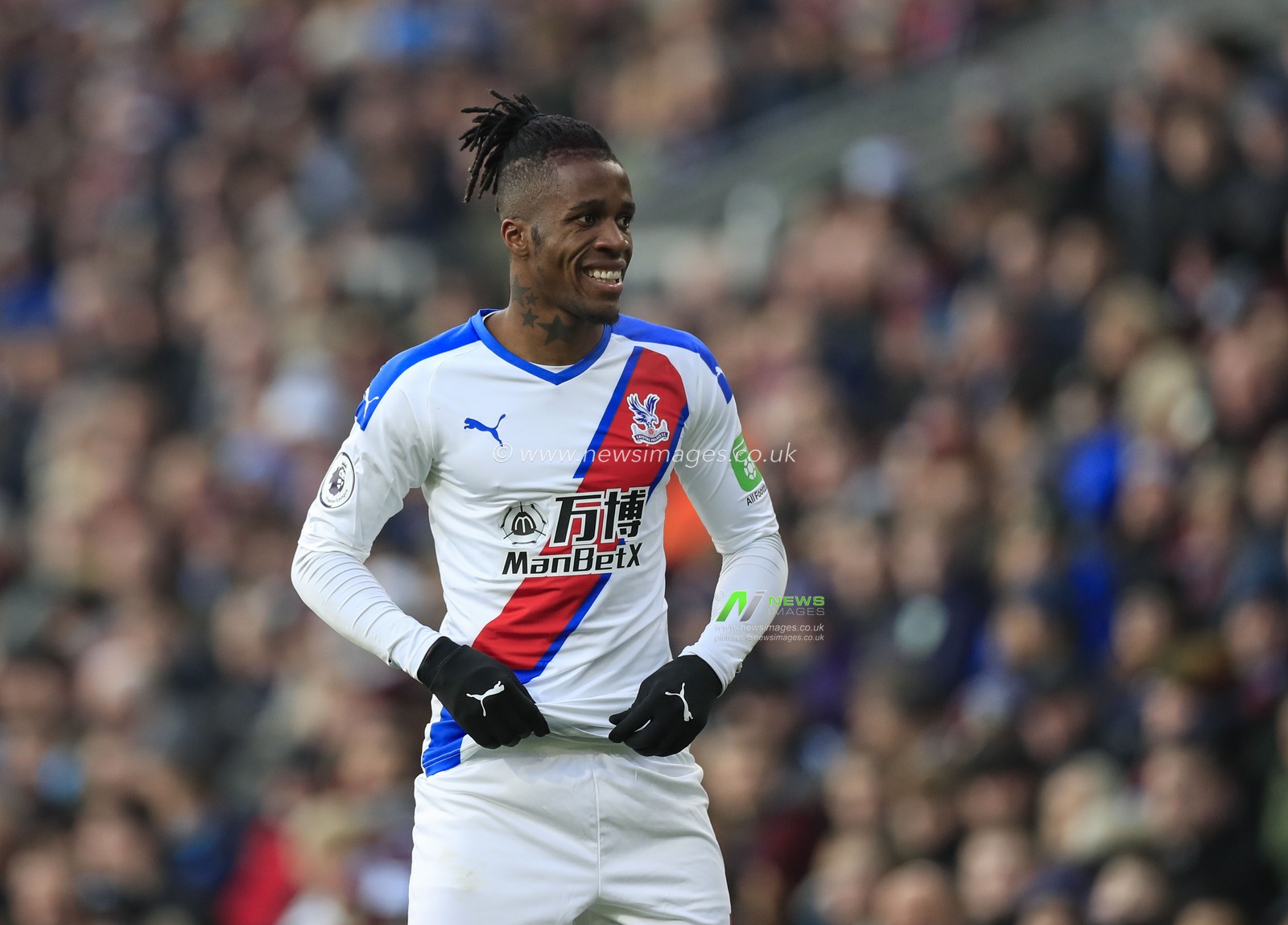 30th November 2019, Turf Moor, Burnley, England; Premier League, Burnley v Crystal Palace : Wilfried Zaha (11) of Crystal Palace  

Credit: Conor Molloy/News Images