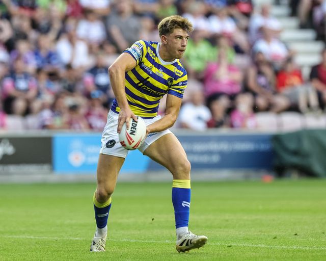 Ewan Irwin of Warrington Wolves with the ball during the Betfred Super League round 18 match Wigan Warriors vs Warrington Wolves at The Brick Community Stadium, Wigan, United Kingdom on 10 July 2026

(Photo by Mark Cosgrove/News Images)