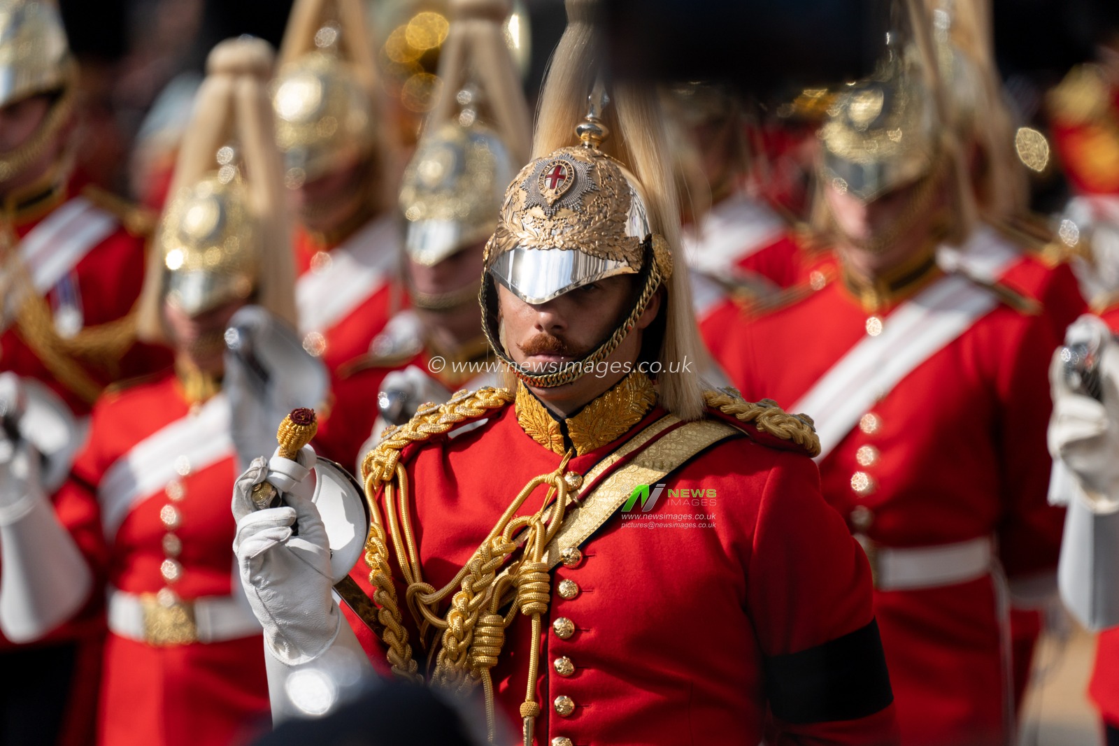 Members of the Household Cavalry march with swords reversed out of respect during the Queen's coffin procession followed by King Charles III and immediate Royal family at Whitehall, London, United Kingdom, 14th September 2022

(Photo by Richard Washbrooke/News Images)