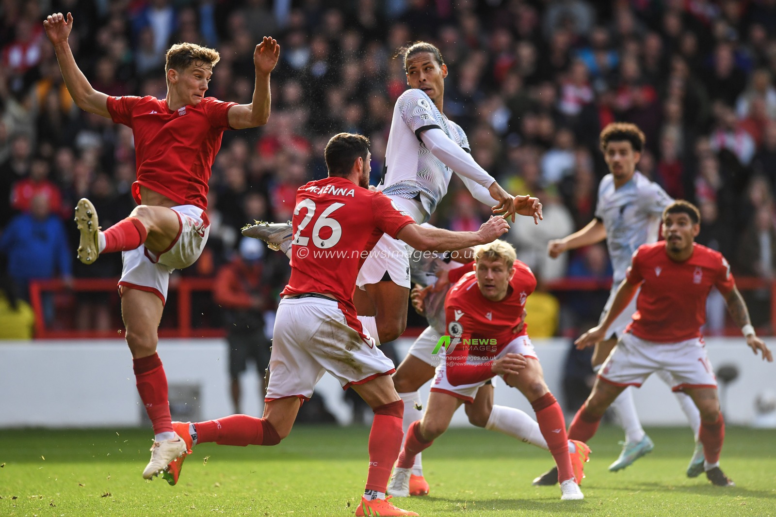 Virgil van Dijk #4 of Liverpool challenges Ryan Yates #22 of Nottingham Forest and Scott McKenna #26 of Nottingham Forest during the Premier League match Nottingham Forest vs Liverpool at City Ground, Nottingham, United Kingdom, 22nd October 2022

(Photo by Mike Jones/News Images)