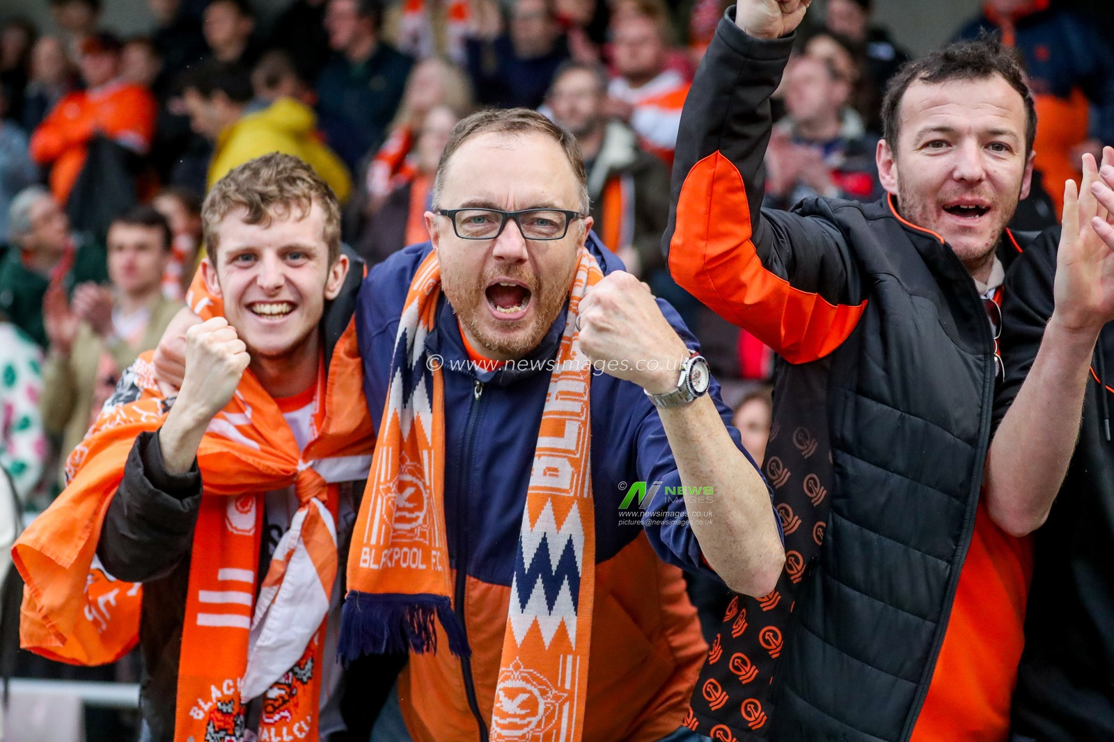 Blackpool fans celebrate after the teams victory following the Sky Bet League 1 match Northampton Town vs Blackpool at Sixfields Stadium, Northampton, United Kingdom, 22nd March 2025

(Photo by Izzy Poles/News Images)