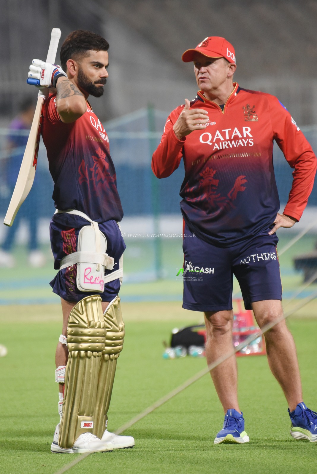 Virat Kohli of Royal Challengers Bengaluru and  head coach Andy Flower attends a training session during the Indian Premier League (IPL) 2025 cricket tournament opening match between Kolkata Knight Riders and Royal Challengers Bengaluru at the Eden Garden Cricket Stadium in Kolkata, India, on March 20, 2025 .Pictures by Debajyoti Chakraborty.(Photo: Debajyoti Chakraborty/News Images)