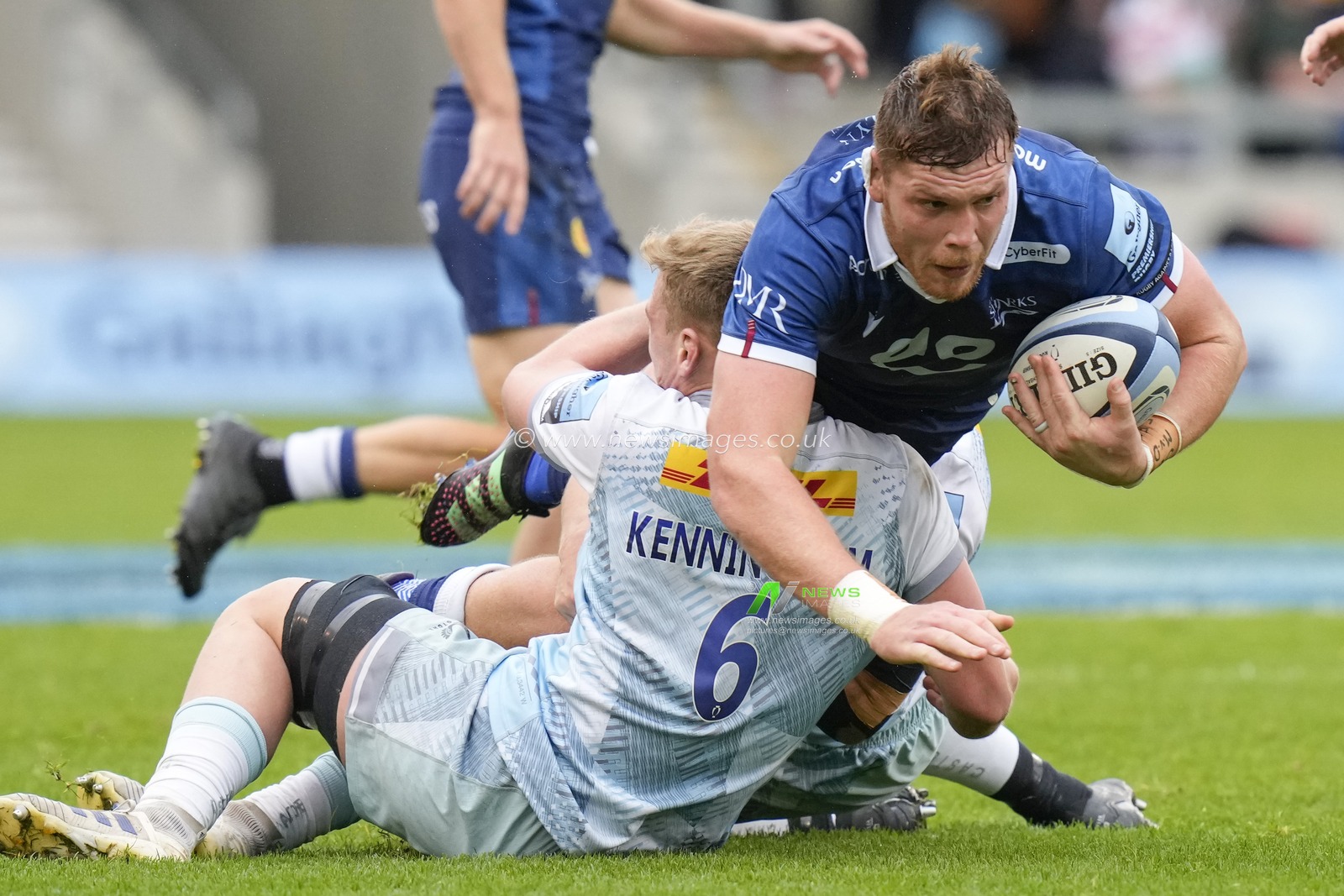 Jack Kenningham #6 of Harlequins tackles Cobus Wiese #4 of Sale Sharks during the Gallagher Premiership match Sale Sharks vs Harlequins at AJ Bell Stadium, Eccles, United Kingdom, 23rd October 2022

(Photo by Steve Flynn/News Images)