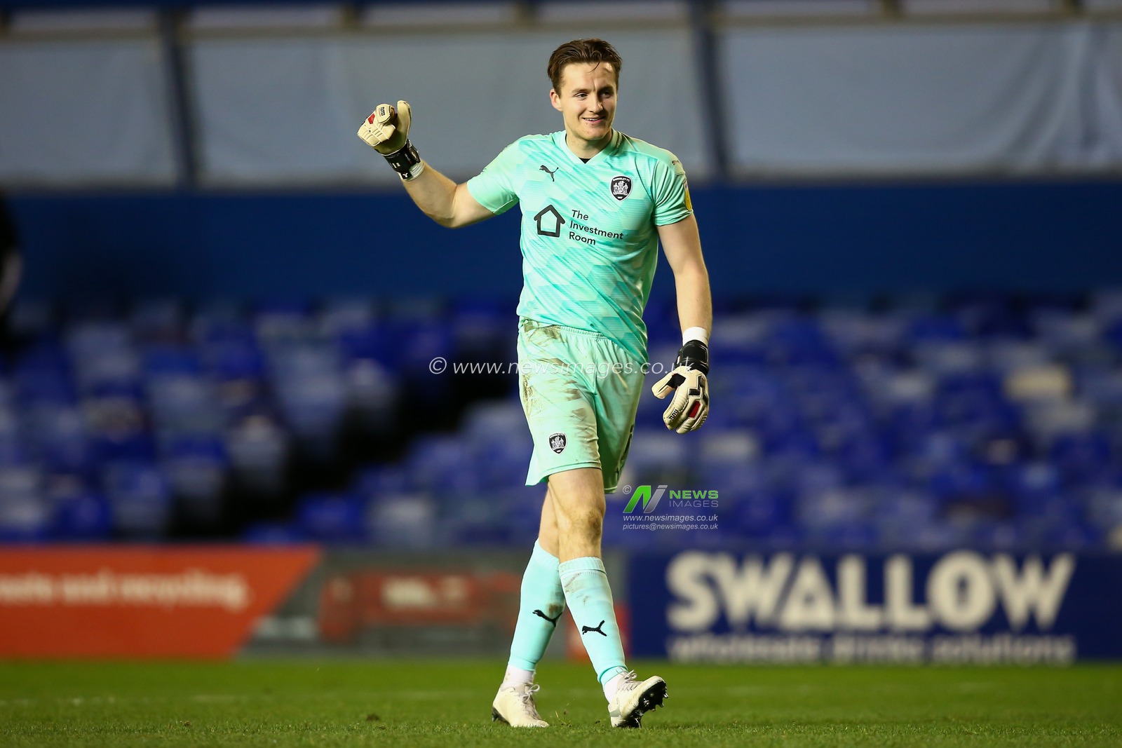 Jack Walton #1 of Barnsley celebrates their win over Birmingham City