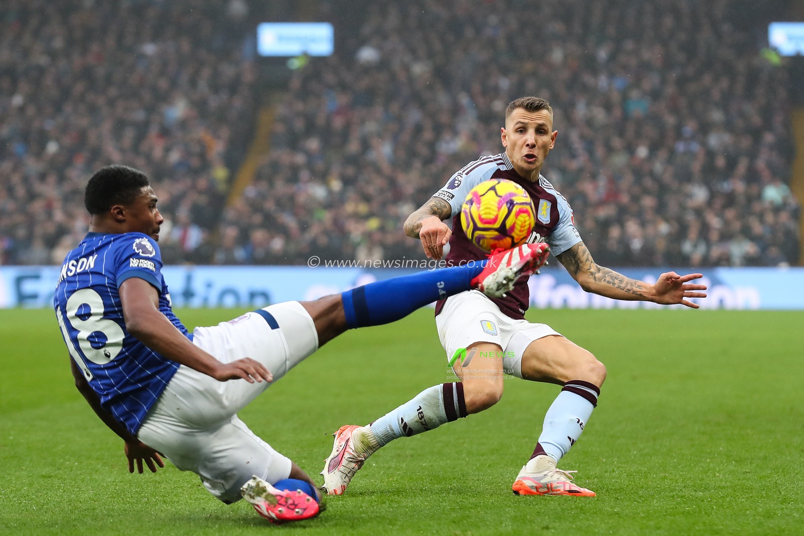 Ben Johnson of Ipswich Town beats Lucas Digne of Aston Villa to the ball during the Premier League match Aston Villa vs Ipswich Town at Villa Park, Birmingham, United Kingdom, 15th February 2025

(Photo by Gareth Evans/News Images)