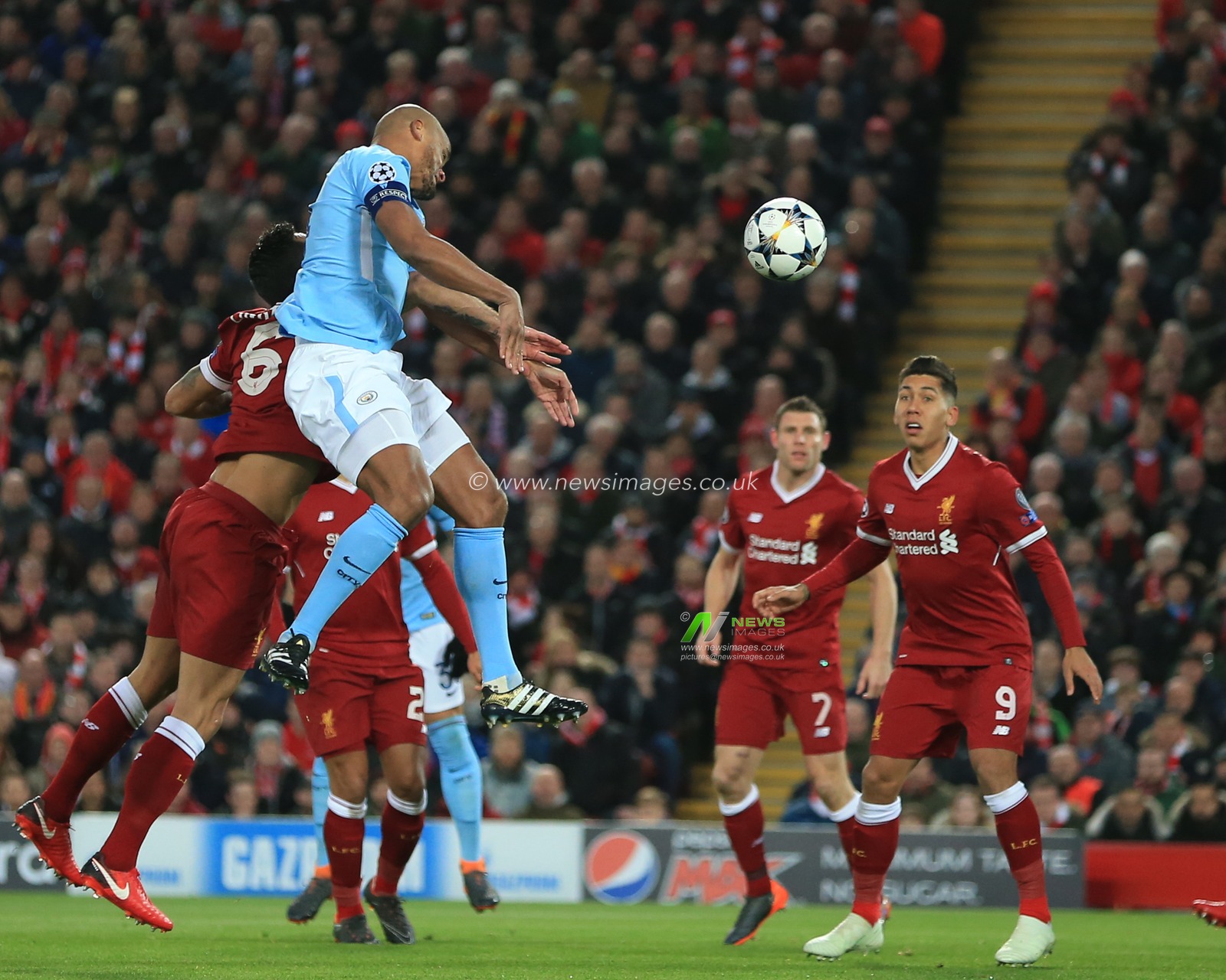 4th April 2018 , Anfield, Liverpool, England; Champions League Quarter Final, first leg, Liverpool v Manchester City; Vincent Company of Manchester City heads on goal