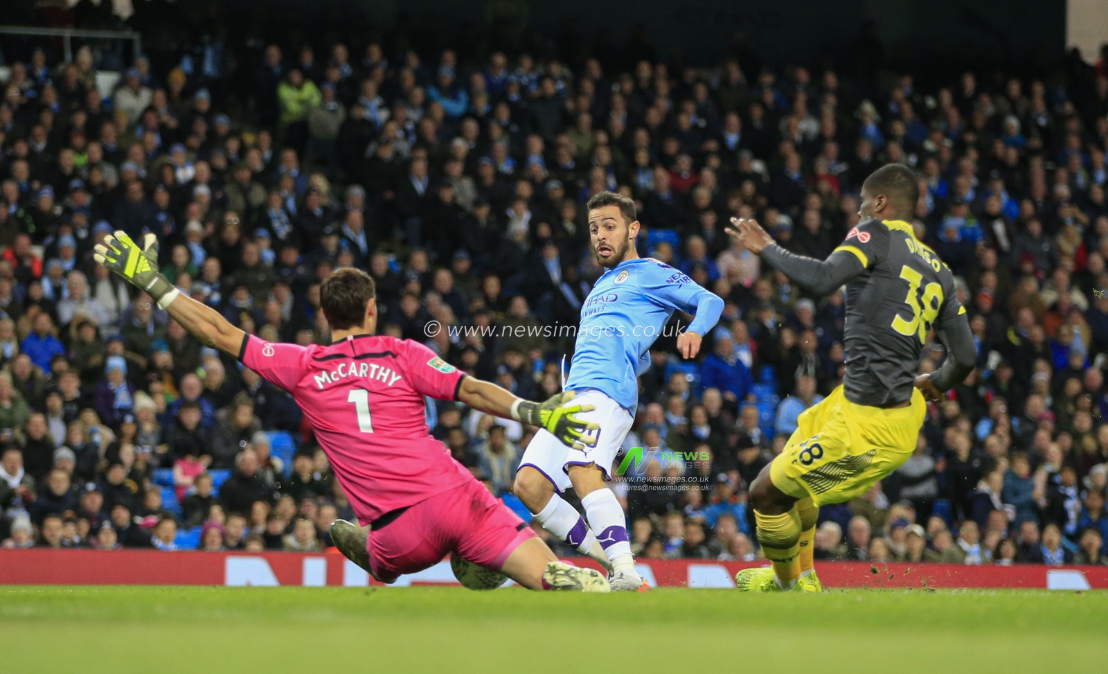 29th October 2019, Etihad Stadium, Manchester, England; Carabao Cup, Manchester City v Southampton : Bernardo Silva (20) of Manchester City has an effort on goal saved by Alex McCarthy (01) of Southampton

Credit: Conor Molloy/News Images