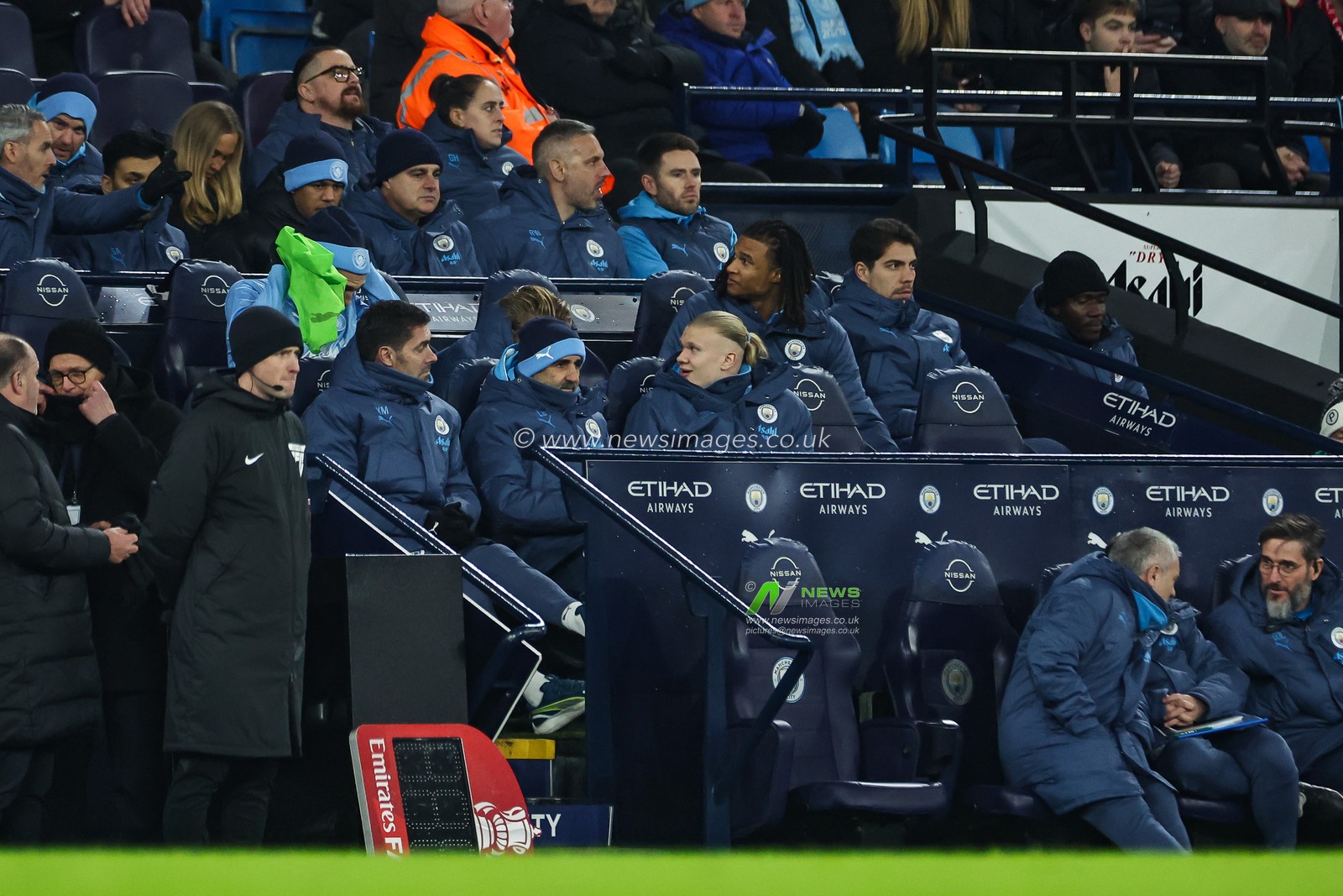 Erling Haaland of Manchester City sits in the dugout during the Emirates FA Cup 3rd Round match Manchester City vs Salford City at Etihad Stadium, Manchester, United Kingdom, 11th January 2025

(Photo by Mark Cosgrove/News Images)