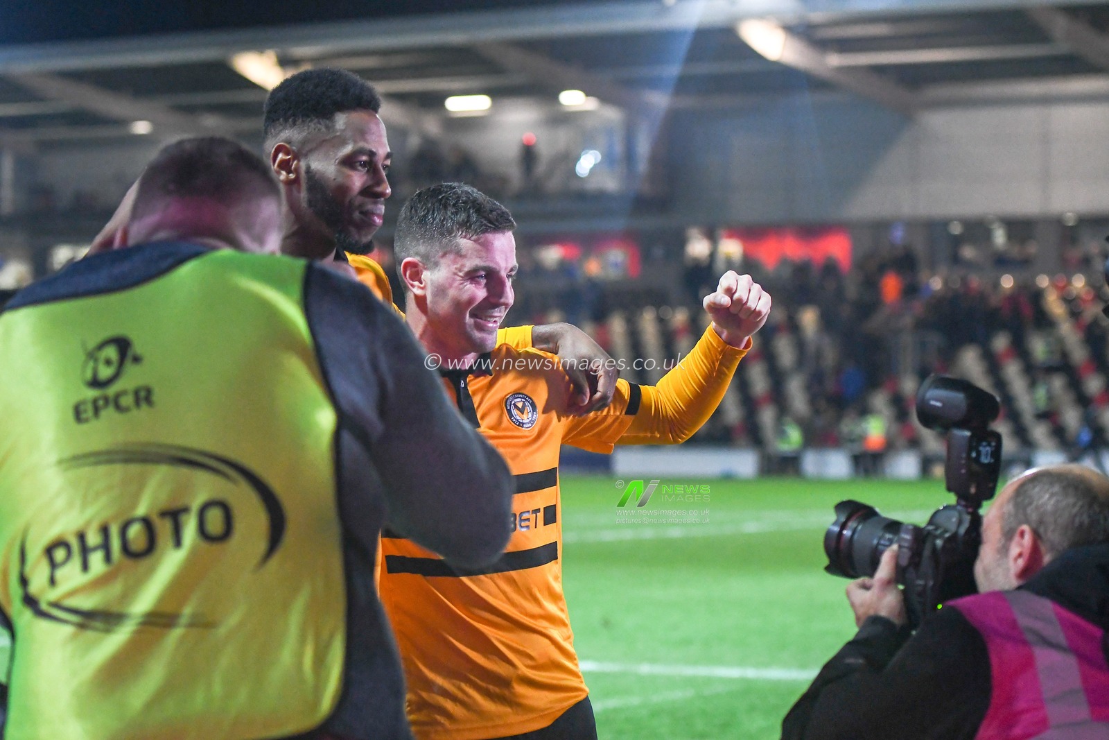 6th January 2019, Rodney Parade, Newport, Wales ; The Emirates FA Cup, 3rd Round, Newport County vs Leicester City : Jamille Matt (11) of Newport County and Padraig Amond (09) of Newport County celebrate for the cameras after the final whistle

Credit: Gareth Dalley/News Images

English Football League images are subject to DataCo Licence