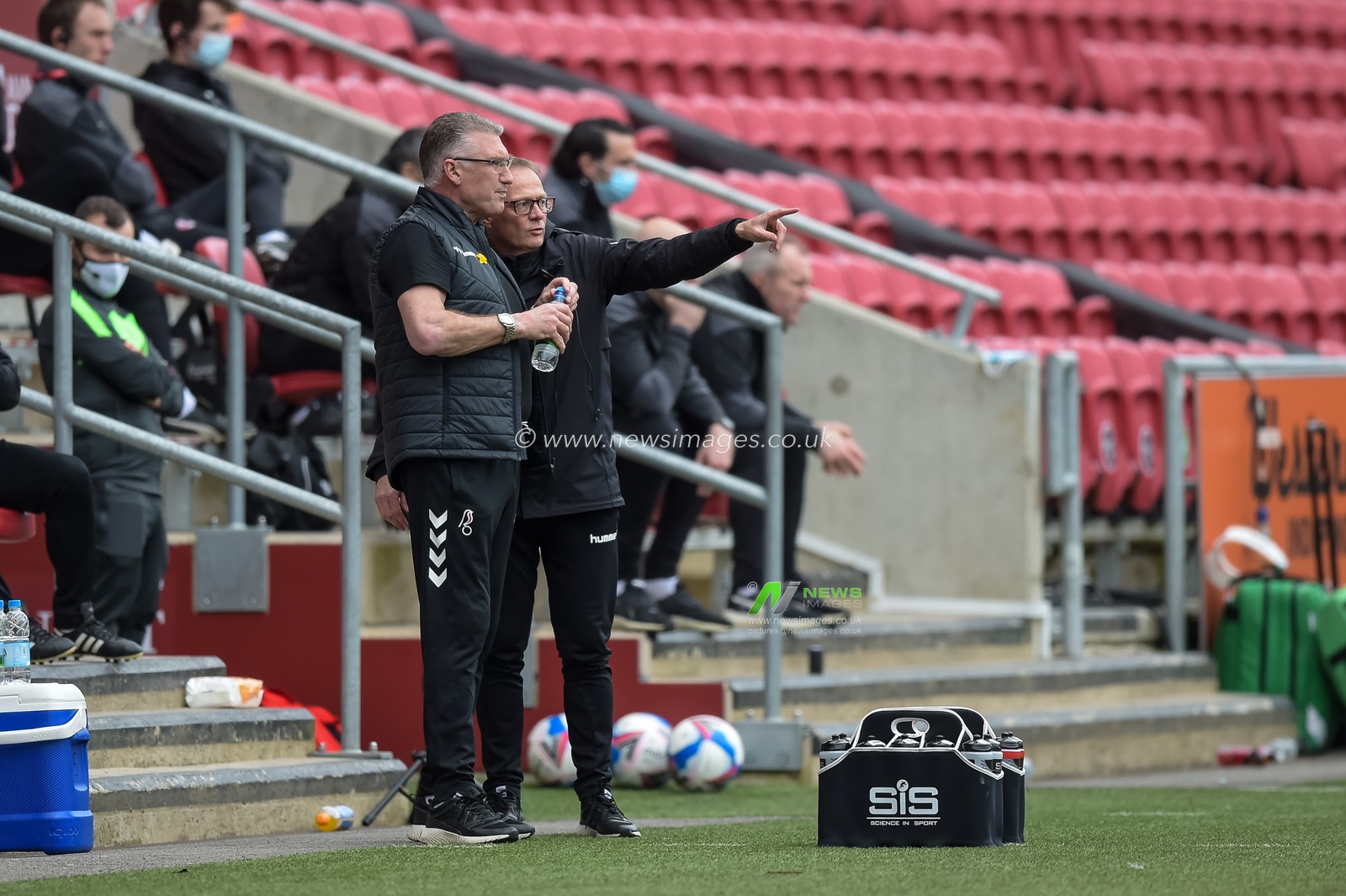 Nigel Pearson manager of Bristol City and Assistant Manager Keith Downing discussing tactics