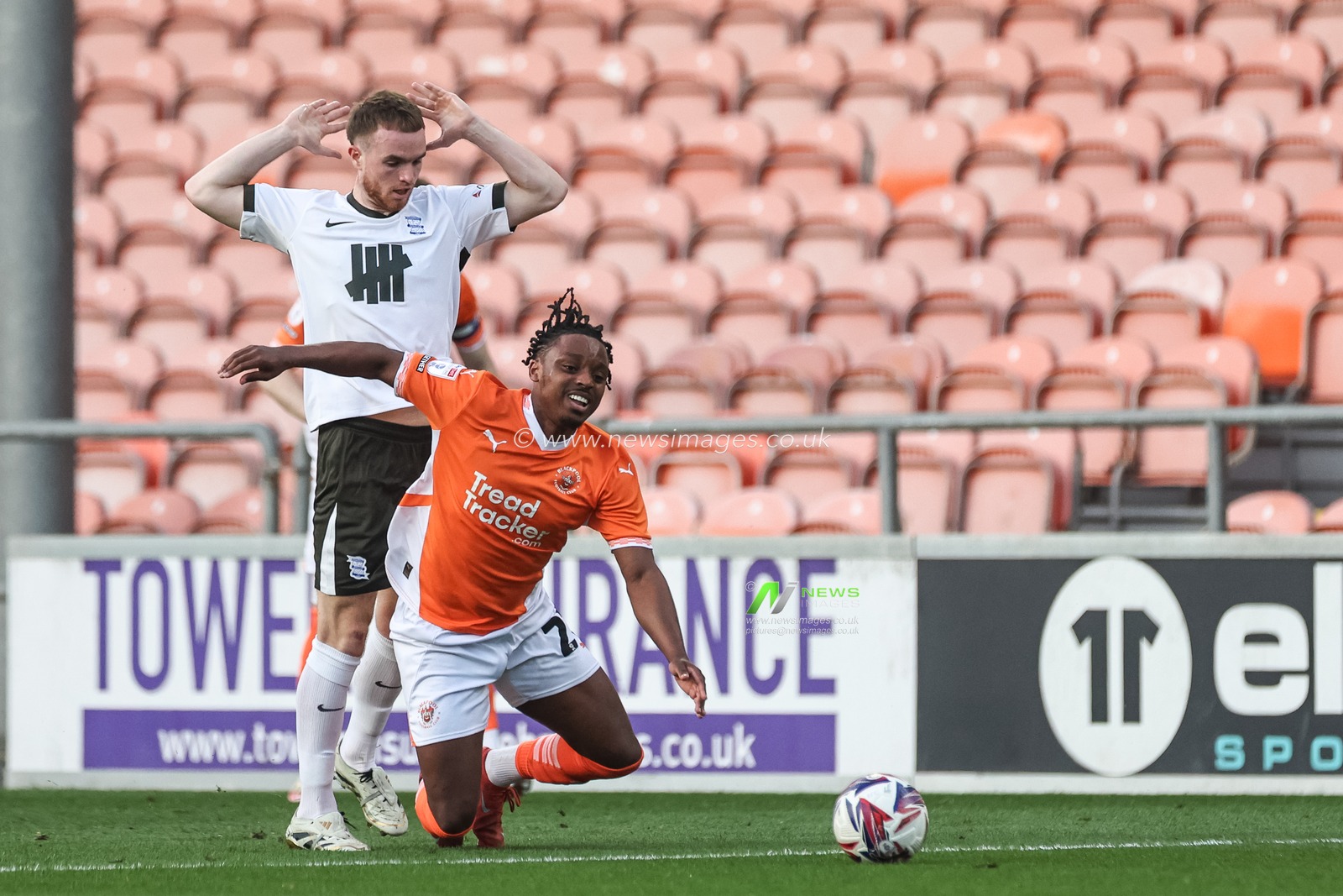Niall Ennis of Blackpool is fouled by Marc Leonard of Birmingham City during the Sky Bet League 1 match Blackpool vs Birmingham City at Bloomfield Road, Blackpool, United Kingdom, 30th April 2025

(Photo by Mark Cosgrove/News Images)