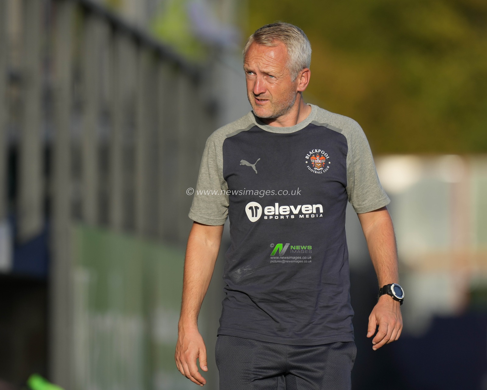 Neil Critchley, Manager of Blackpool watches his players warmup before the Papa John's Trophy match Barrow vs Blackpool at the SO Legal Stadium, Barrow-in-Furness, United Kingdom, 5th September 2023

(Photo by Steve Flynn/News Images)