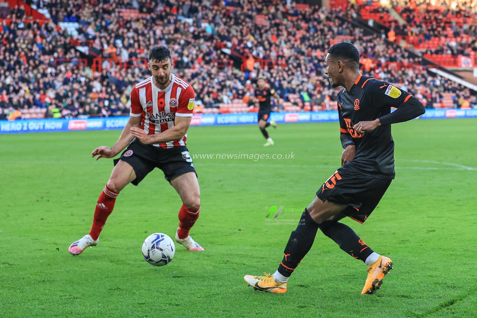 Demetri Mitchell #15 Of Blackpool crosses the ball