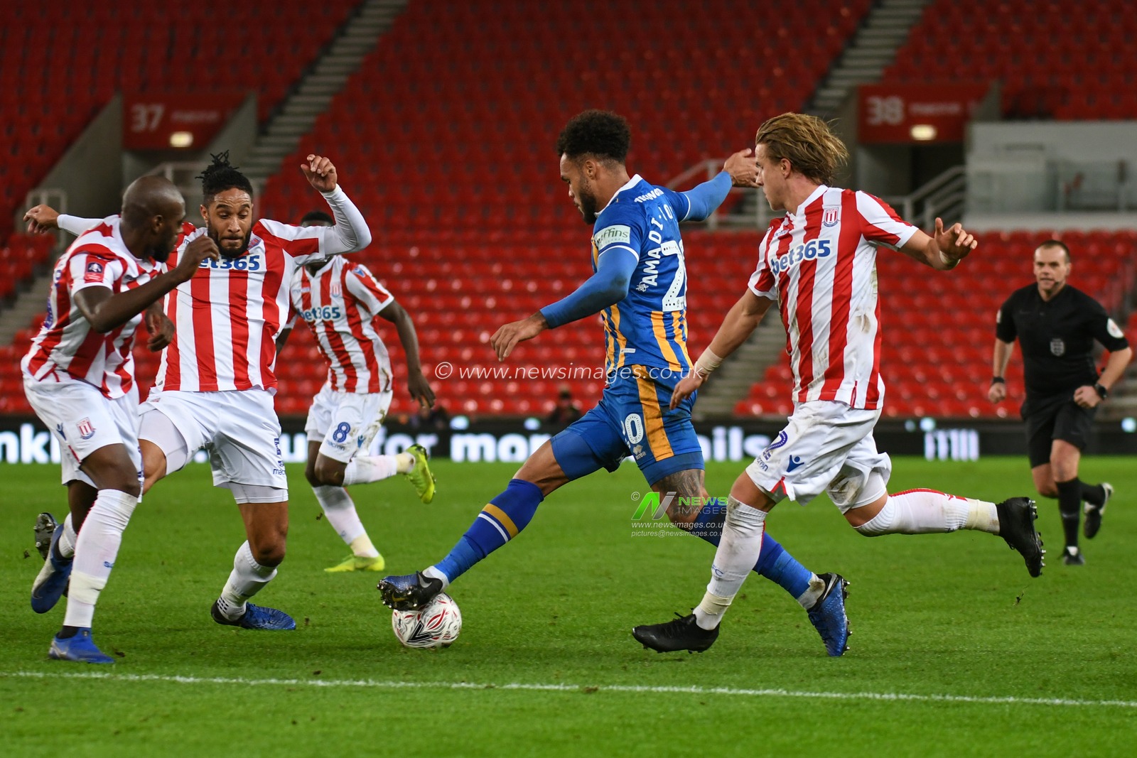 15th January 2019, Bet 365 Stadium, Stoke-on-Trent, England; Emirates FA Cup, 3rd Round replay, Stoke City vs Shrewsbury Town ; Aaron Holloway (20) of Shrewsbury Town is tackled by Ashley Williams (5) of Stoke City 


Credit: Richard Long/News Images

English Football League images are subject to DataCo Licence