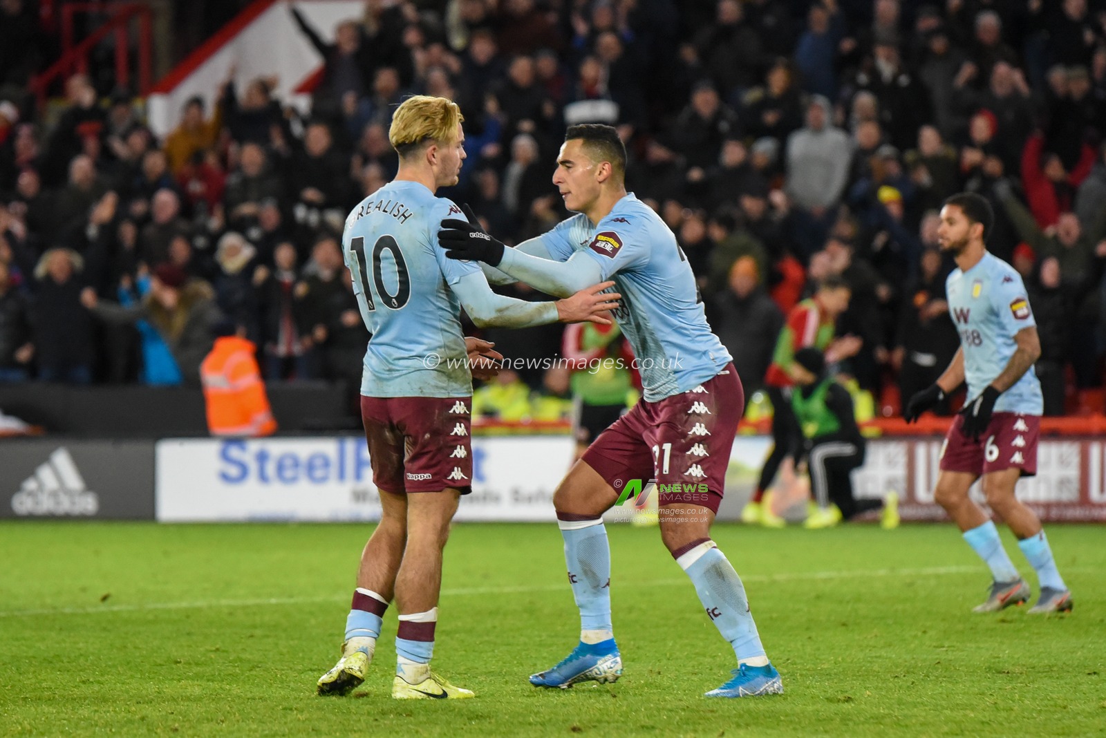 14th December 2019, Bramall Lane, Sheffield, England; Premier League, Sheffield United v Aston Villa : Jack Grealish (10) of Aston Villa is offered support by Anwar El Ghazi (21) after he sees his penalty hit the bar

Credit: Simon Whitehead/News Images