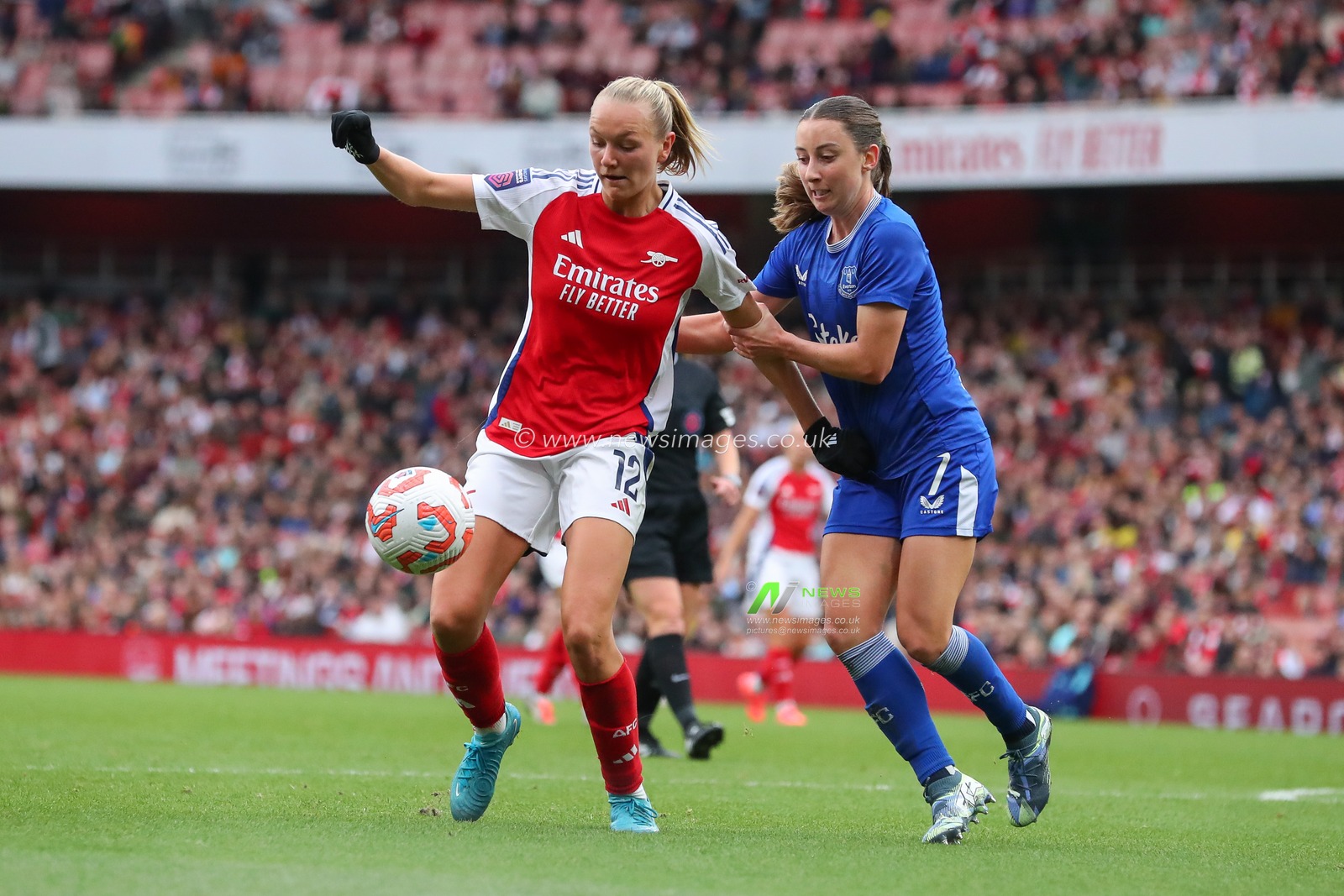 Frida Maanum of Arsenal is put under pressure by Clare Wheeler of Everton during the The FA Women's Super League match Arsenal Women vs Everton Women at Emirates Stadium, London, United Kingdom, 6th October 2024

(Photo by Izzy Poles/News Images)