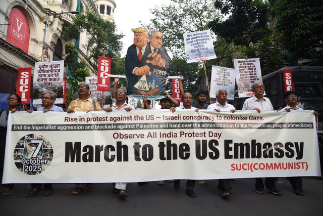 Activists of Social Unity Center of India (SUCI) hold placards and an effigy of US President Donald Trump and Israel's Prime Minister Benjamin Netanyahu during a protest against Western policy in the Israel-Hamas conflict, near US Embassy in Kolkata, Eastern India, 07 October 2025.Photo by Debajyoti Chakraborty.(Photo: Debajyoti Chakraborty/News Images)