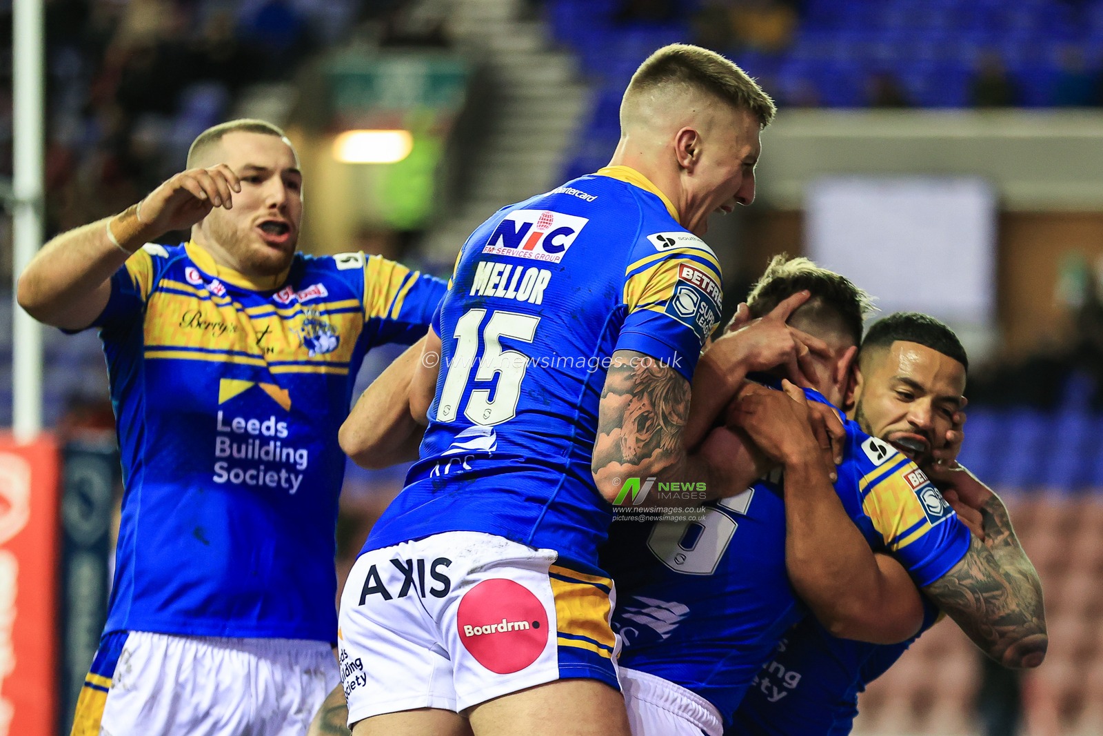 Blake Austin #6 of Leeds Rhinos celebrates his try