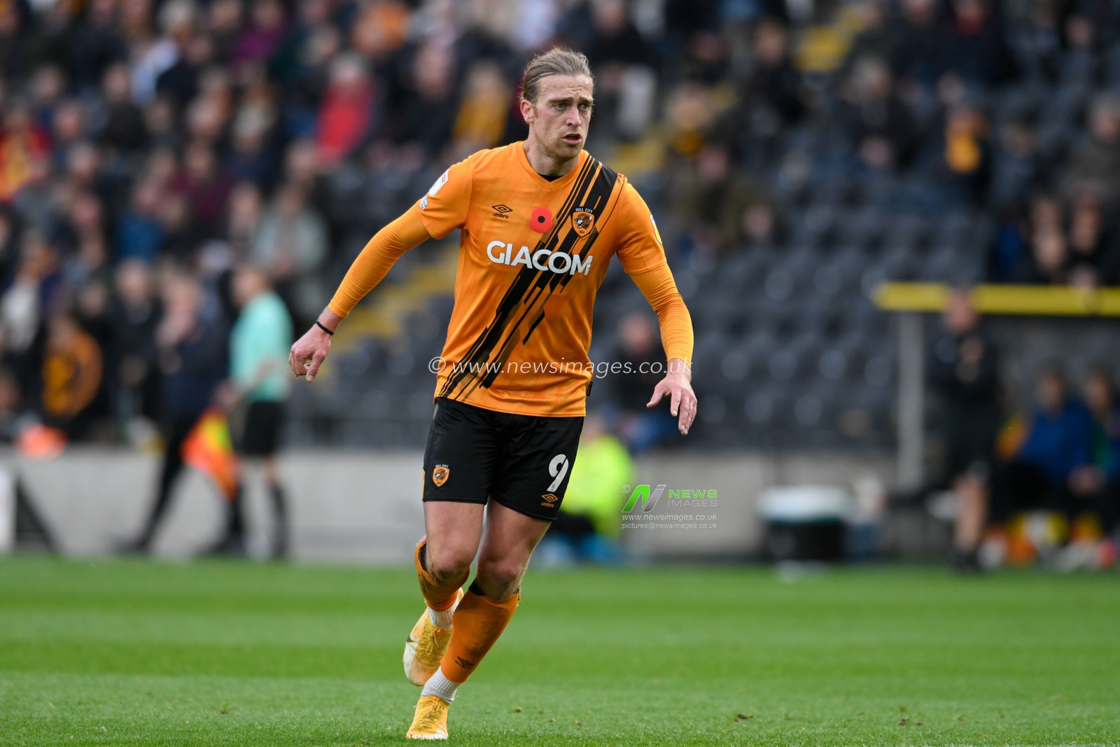 Tom Eaves #9 of Hull City in action during the game