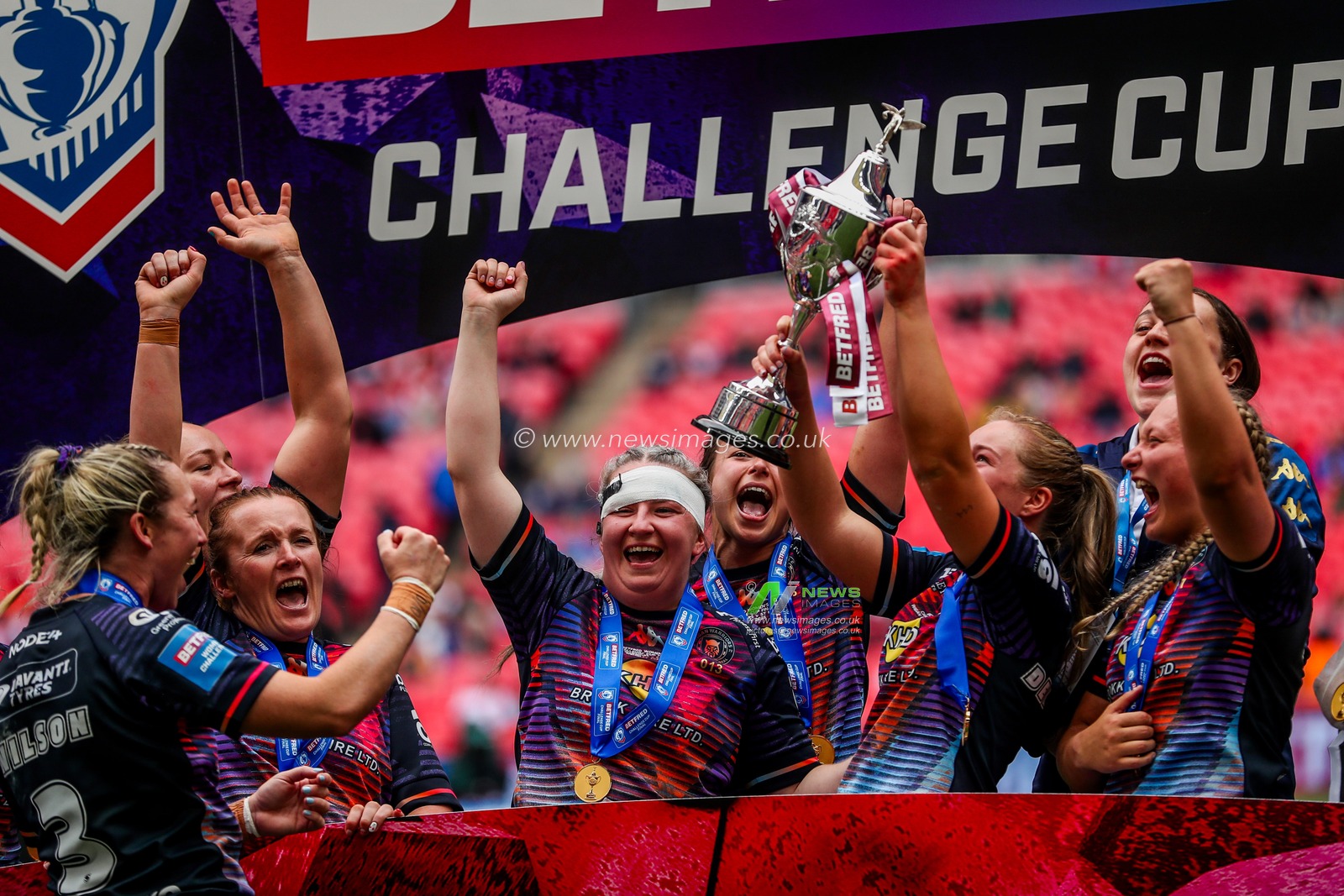 Wigan Warriors lift the Challenge Cup after the teams victory following the Betfred Women's Challenge Cup Final St Helens vs Wigan Warriors at Wembley Stadium, London, United Kingdom, 7th June 2025

(Photo by Izzy Poles/News Images)