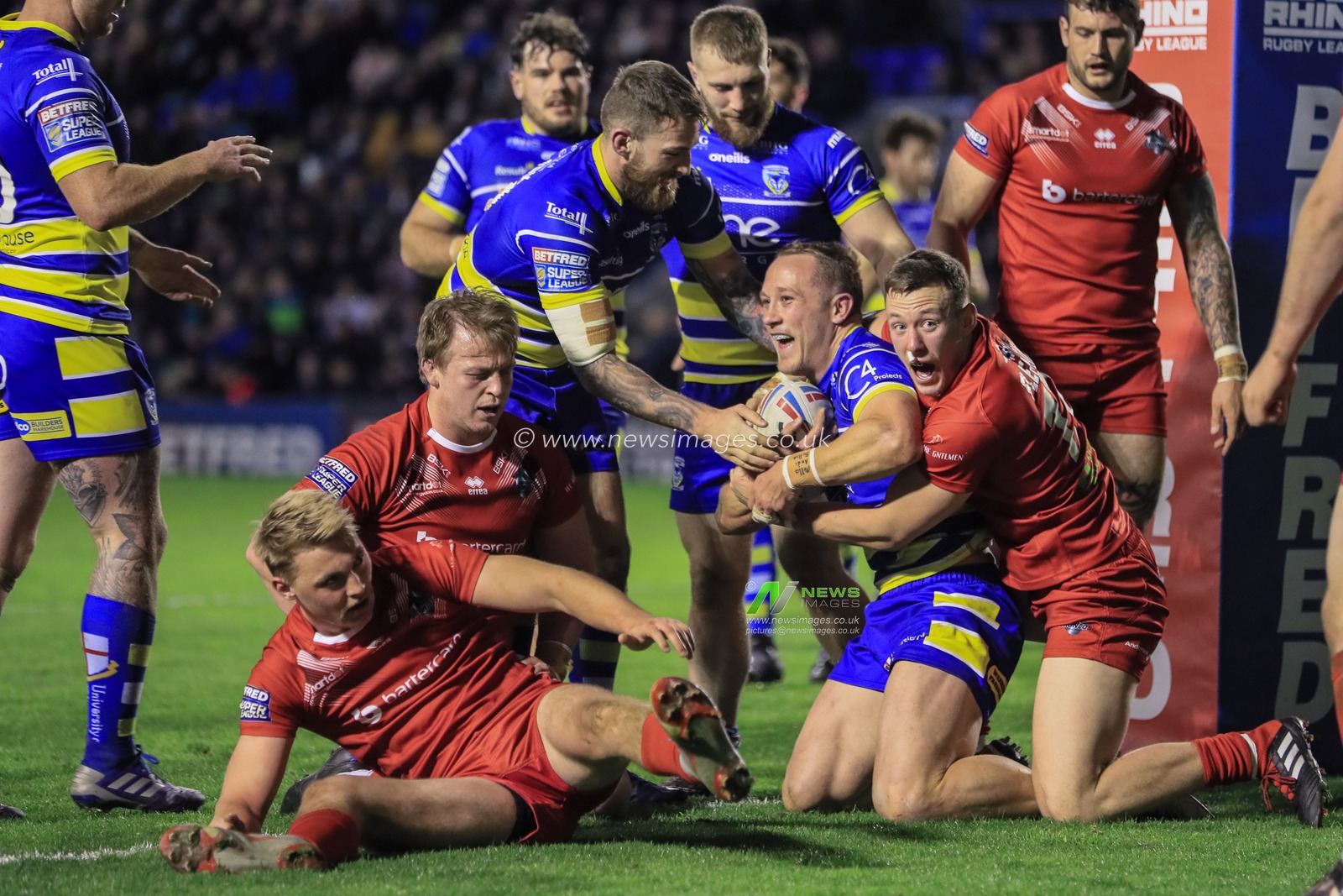 5th April 2019 , Halliwell Jones Stadium, Warrington, England;  Betfred Super League, Round 9, Warrington Wolves vs London Broncos ; Jason Clark (14) of Warrington Wolves celebrates his try 

Credit: Mark Cosgrove/News Images