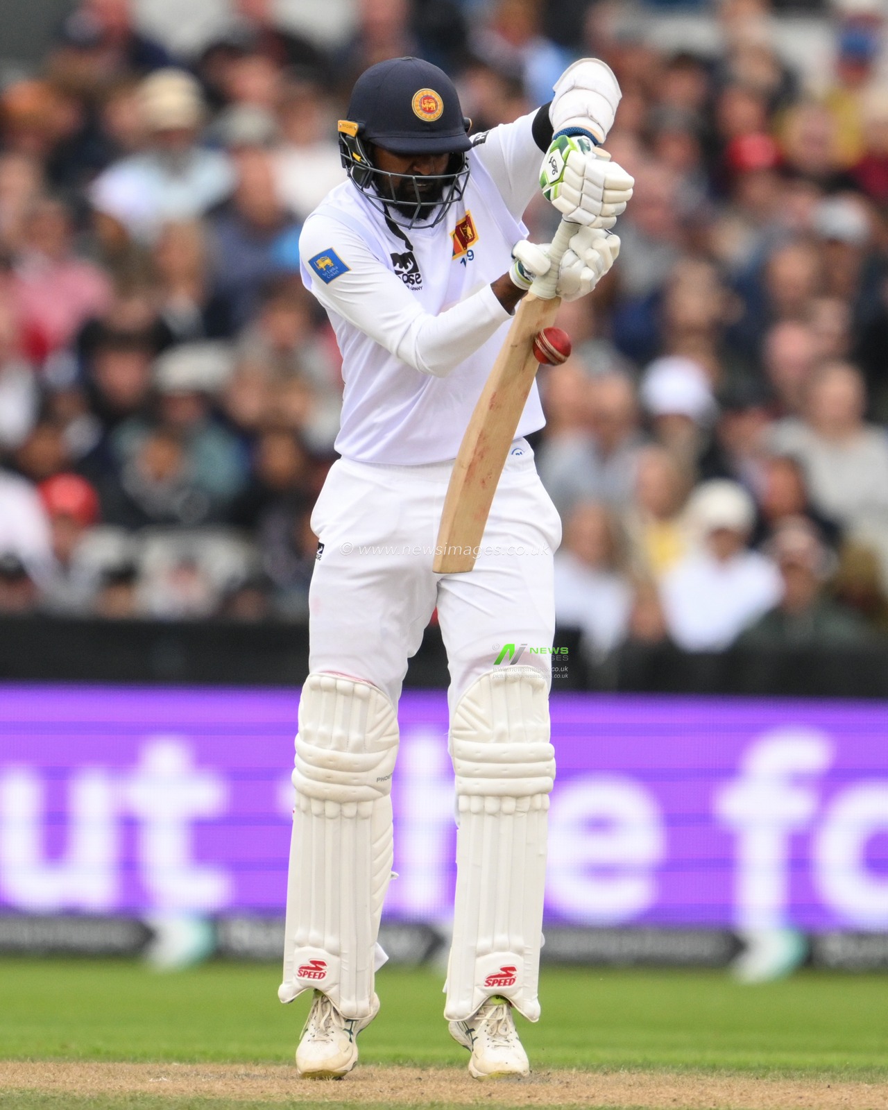 Prabath Jayasuriya of Sri Lanka fends the ball off during the England Men v Sri Lanka 1st Rothesay Test Match at Old Trafford, Manchester, United Kingdom, 20th August 2024

(Photo by Craig Thomas/News Images)