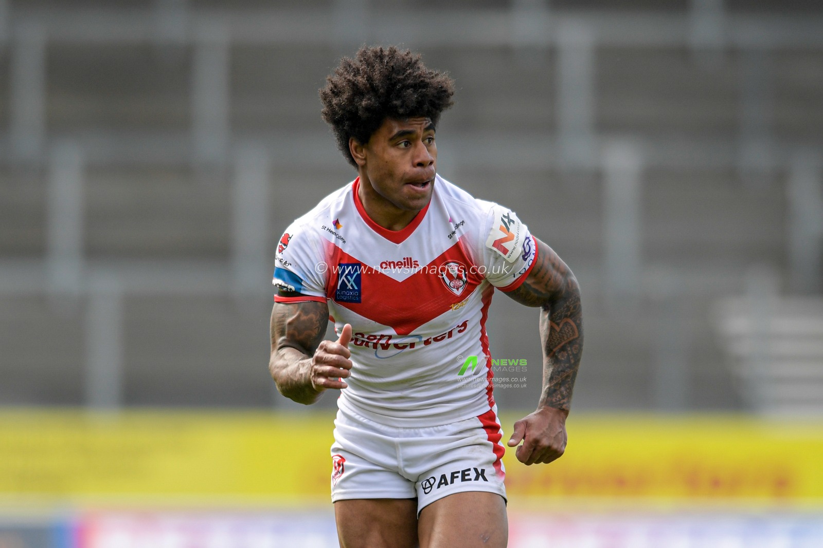 Kevin Naiqama (3) of St Helens in action during the game