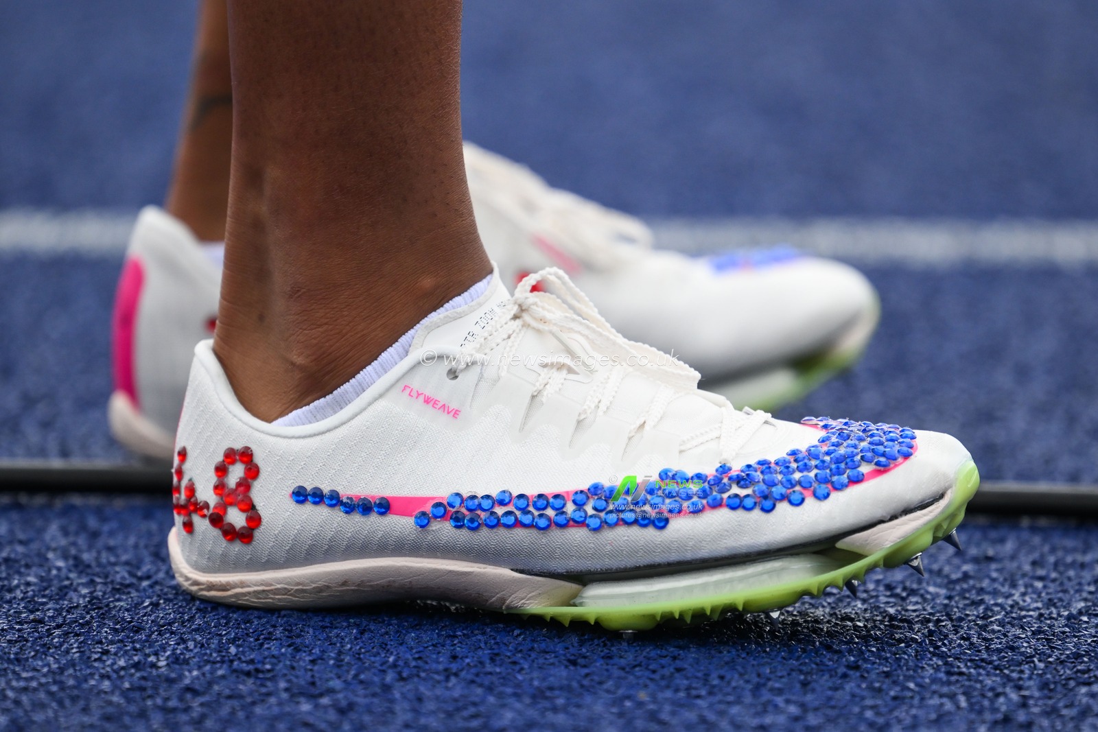 Amber Anning sequinned running spikes during the Microplus UK Athletics Championships Day 2 at Manchester Regional Arena, Manchester, United Kingdom, 30th June 2024

(Photo by Craig Thomas/News Images)