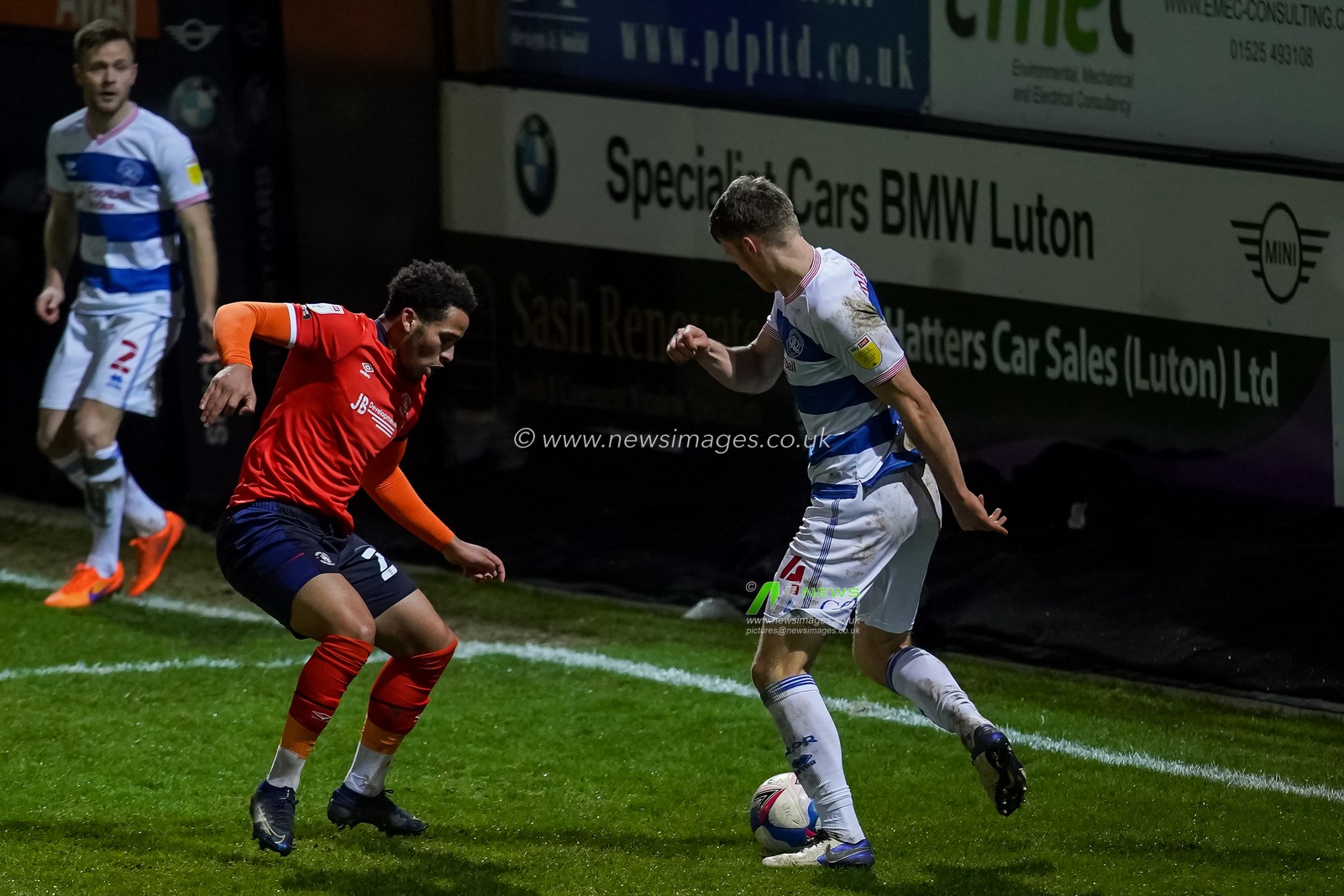 Rob Dickie #4 of Queens Park Rangers shows his ball skills on Sam Nombe #27 of Luton Town