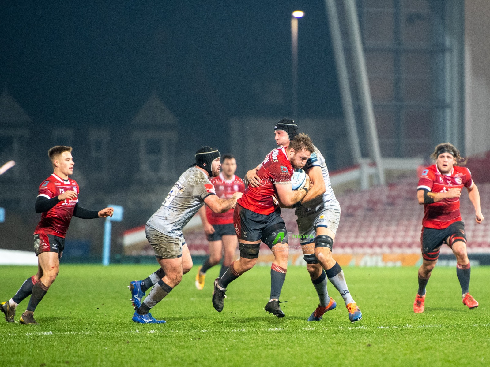RUAN ACKERMANN #8 of Gloucester Rugby drives forward with the ball.