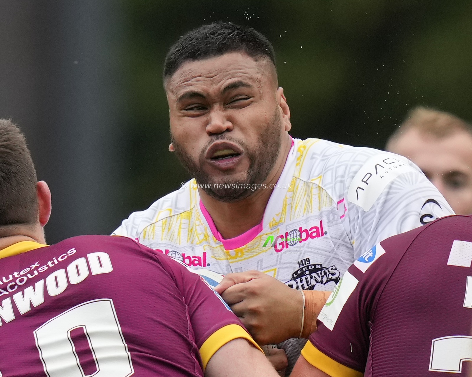 Sam Lisone #15 of Leeds Rhinos runs at the Huddersfield Giants defence during the Betfred Super League Round 23 match Huddersfield Giants vs Leeds Rhinos at John Smith's Stadium, Huddersfield, United Kingdom, 27th August 2023

(Photo by Steve Flynn/News Images)