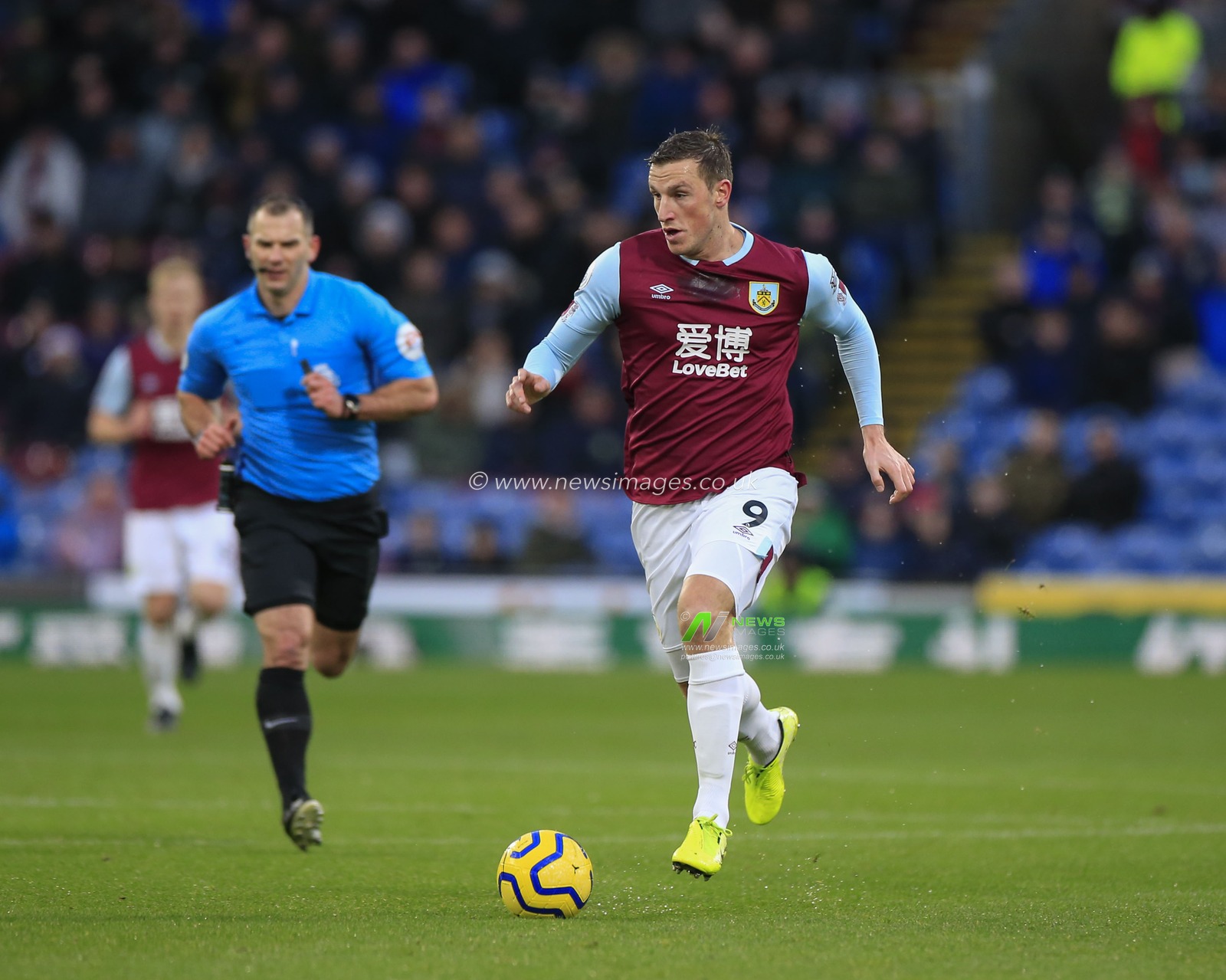 14th December 2019, Turf Moor, Burnley, England; Premier League, Burnley v Newcastle United : Chris Wood (9) of Burnley runs with the ball

Credit: Conor Molloy/News Images