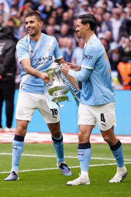 Rodri of Manchester City and Tijjani Reijnders of Manchester City with the Fa Cup trophy during the Emirates FA Cup Final match Chelsea vs Manchester City at Wembley Stadium, London, United Kingdom on 16 May 2026

(Photo by Harvey Murphy/News Images)