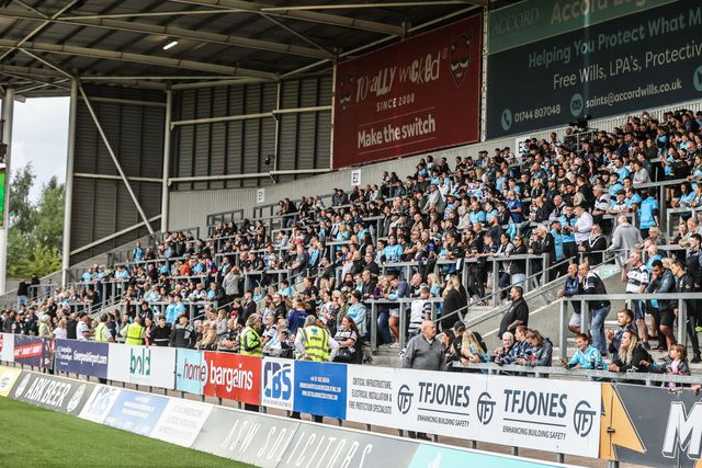 Hull FC fans in the away stand during the Betfred Super League round 23 match St Helens vs Hull FC at Totally Wicked Stadium, St Helens, United Kingdom, 22nd August 2025

(Photo by Alfie Cosgrove/News Images)