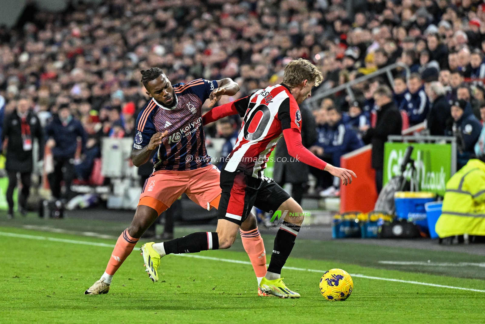 Nuno Tavares of Nottingham Forest and Mads Roerslev of Brentford battle for the ball during the Premier League match Brentford vs Nottingham Forest at The Gtech Community Stadium, London, United Kingdom, 20th January 2024

(Photo by Cody Froggatt/News Images)