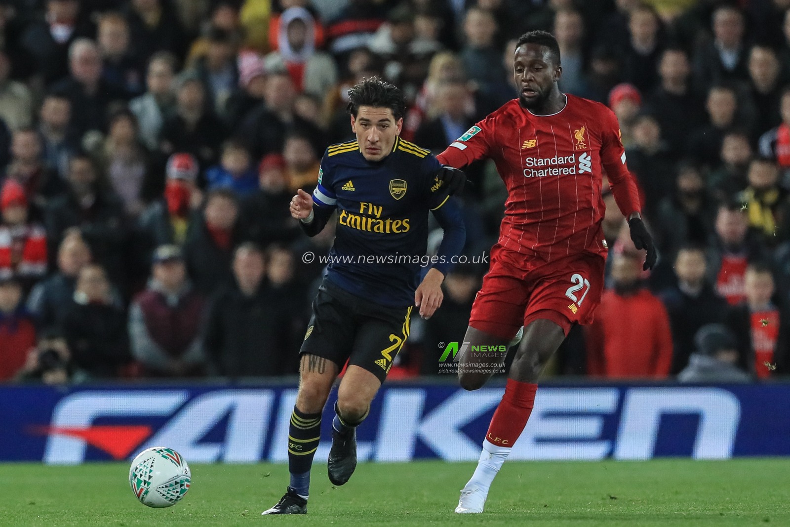 30th October 2019, Anfield, Liverpool, England; Carabao Cup, Liverpool v Arsenal : Divock Origi (27) of Liverpool pulls back HÃ©ctor Bellerin (2) of Arsenal 

Credit: Mark Cosgrove/News Images