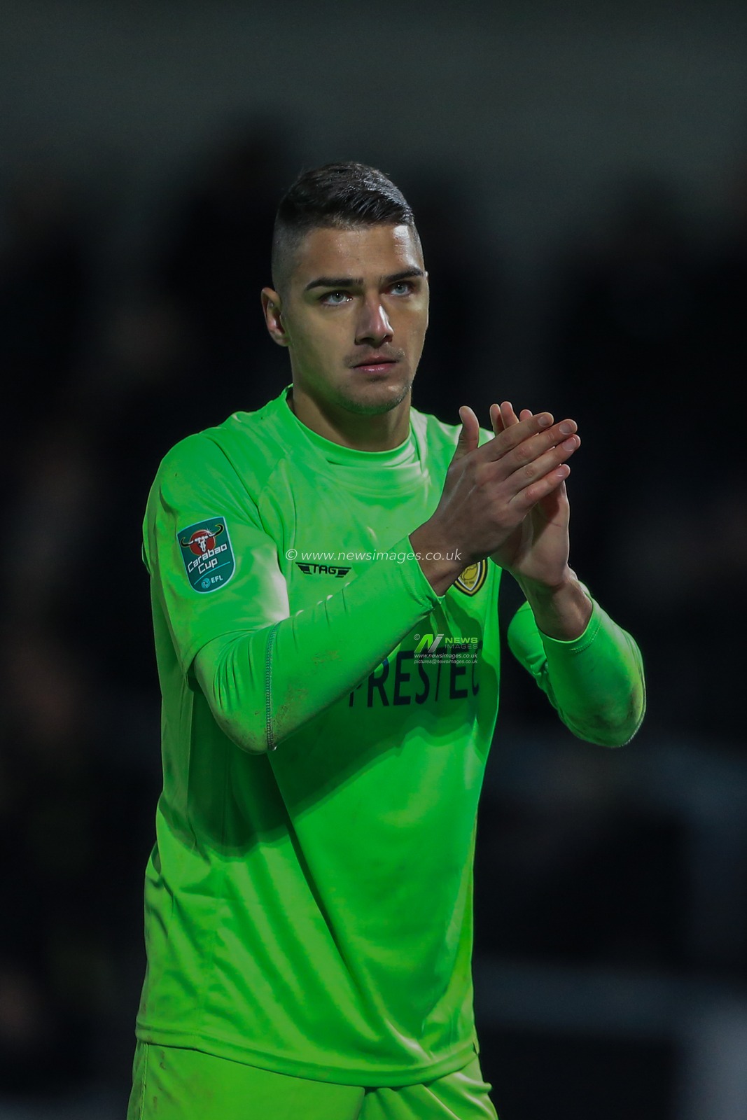 30th October 2018, Pirelli Stadium, Burton upon Trent, England; Carabao EFL Cup, Fourth Round, Burton Albion v Nottingham Forest :  Dimitar Evtimov (26) of Burton Albion applauds the fans after winning 

Credit: Mark Cosgrove/News Images

English Football League images are subject to DataCo Licence