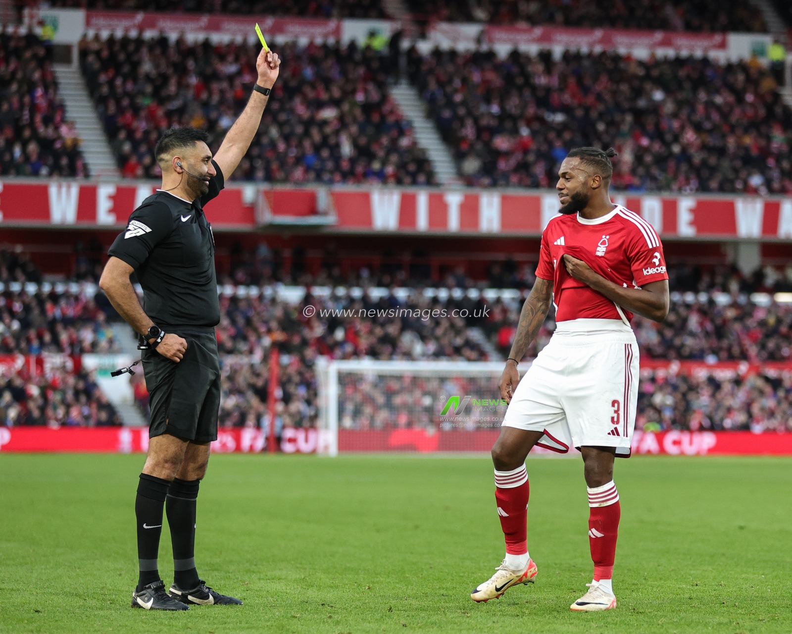Referee Sunny Singh Gill gives a yellow card to Nuno Tavares of Nottingham Forest during the Emirates FA Cup  Third Round match Nottingham Forest vs Blackpool at City Ground, Nottingham, United Kingdom, 7th January 2024

(Photo by Mark Cosgrove/News Images)