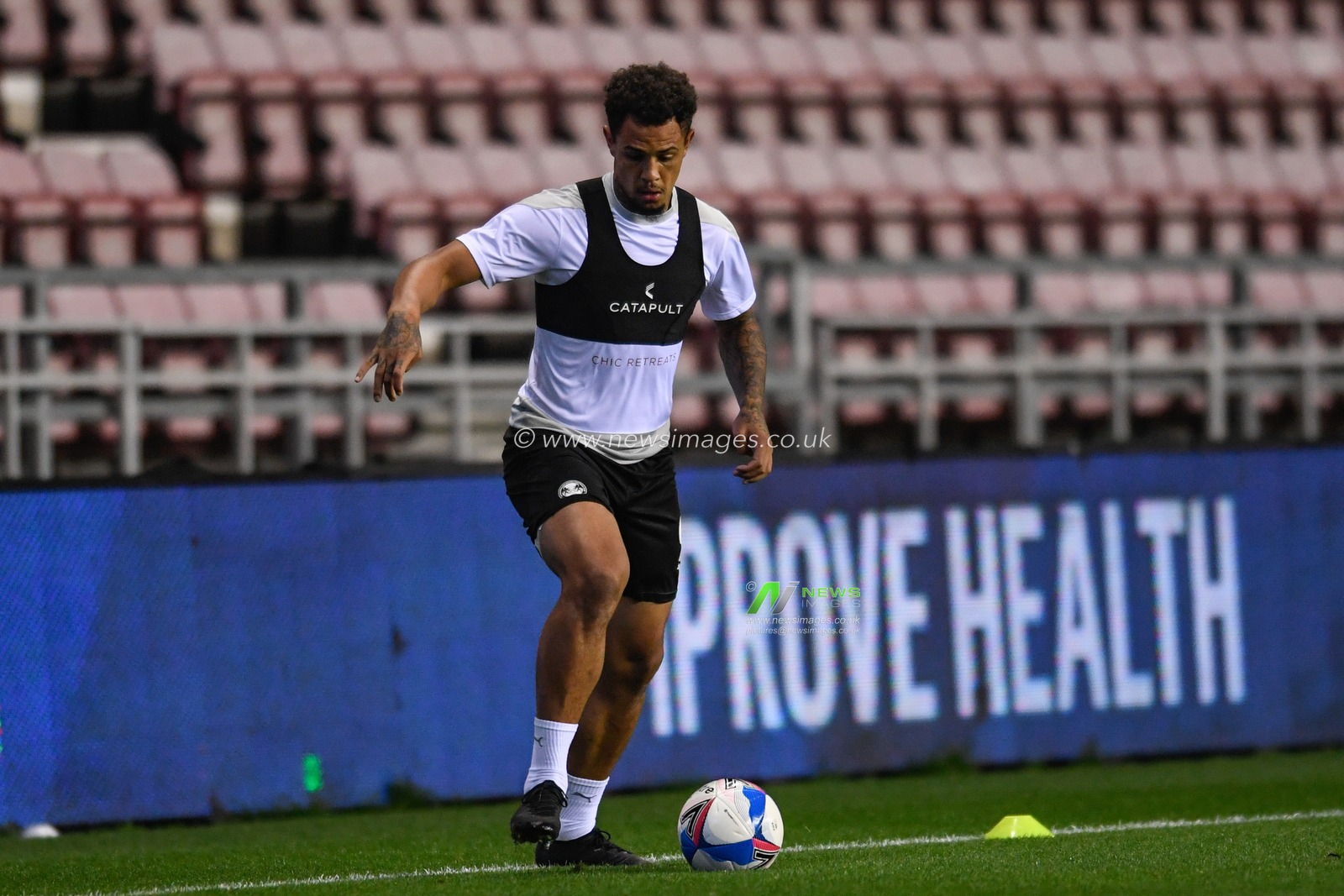 Jonson Clarke-Harris (9) of Peterborough United warming up before the game