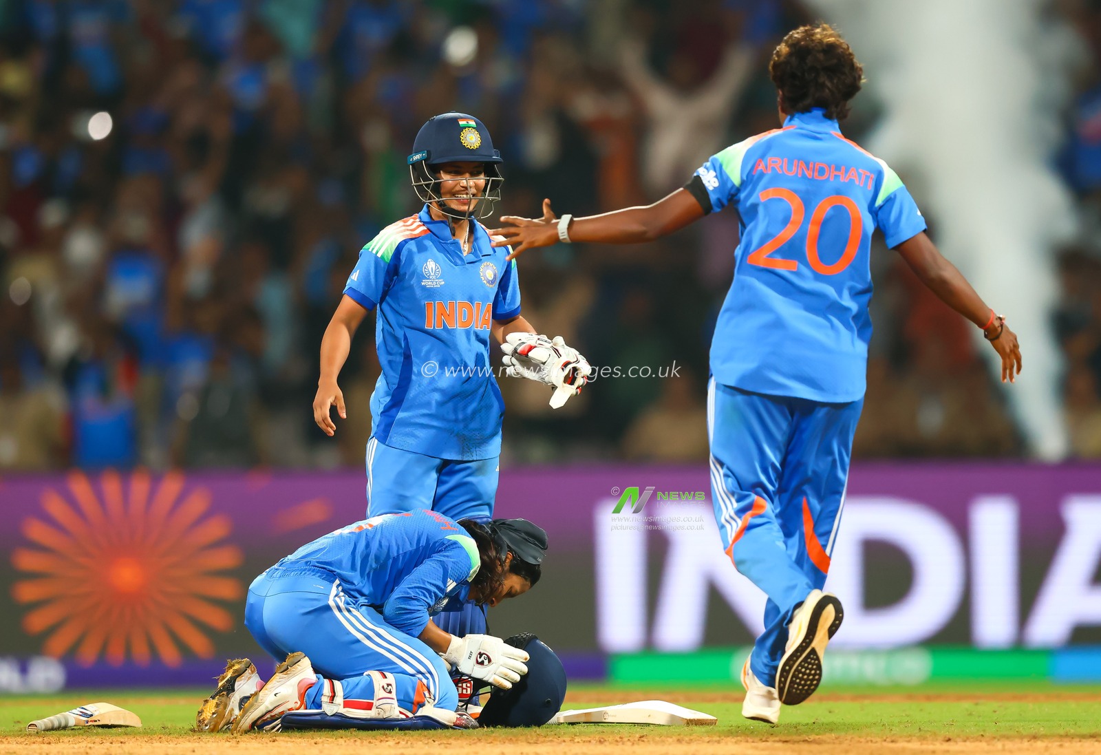 Arundhati Reddy of India Jemimah Rodrigues of India and Amanjot Kaur of India win the semi final and celebrates with Team India during the ICC Women's ODI Cricket World Cup Semi Final match India vs Australia at Dr. D.Y. Patil Sports Academy, Navi Mumbai, India, 30th October 2025

(Photo by Shubhajit Roy Karmakar/News Images)