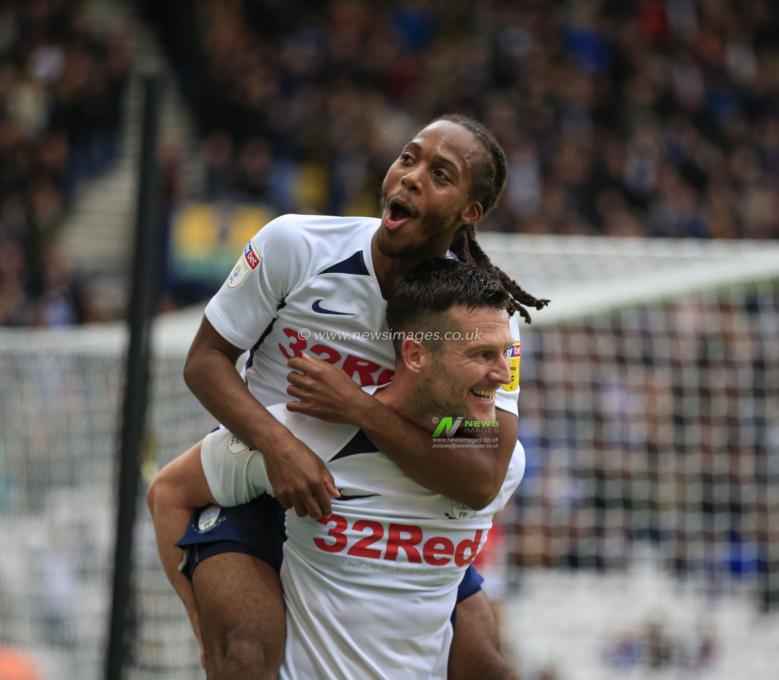 5th October 2019, Deepdale, Preston, England; Sky Bet Championship, Preston North End v Barnsley : Daniel Johnson (11) of Preston North End celebrates with David Nugent (35) after scoring the third goal in the 61st minute, 3-1 to Preston
Credit: Conor Molloy/News Images