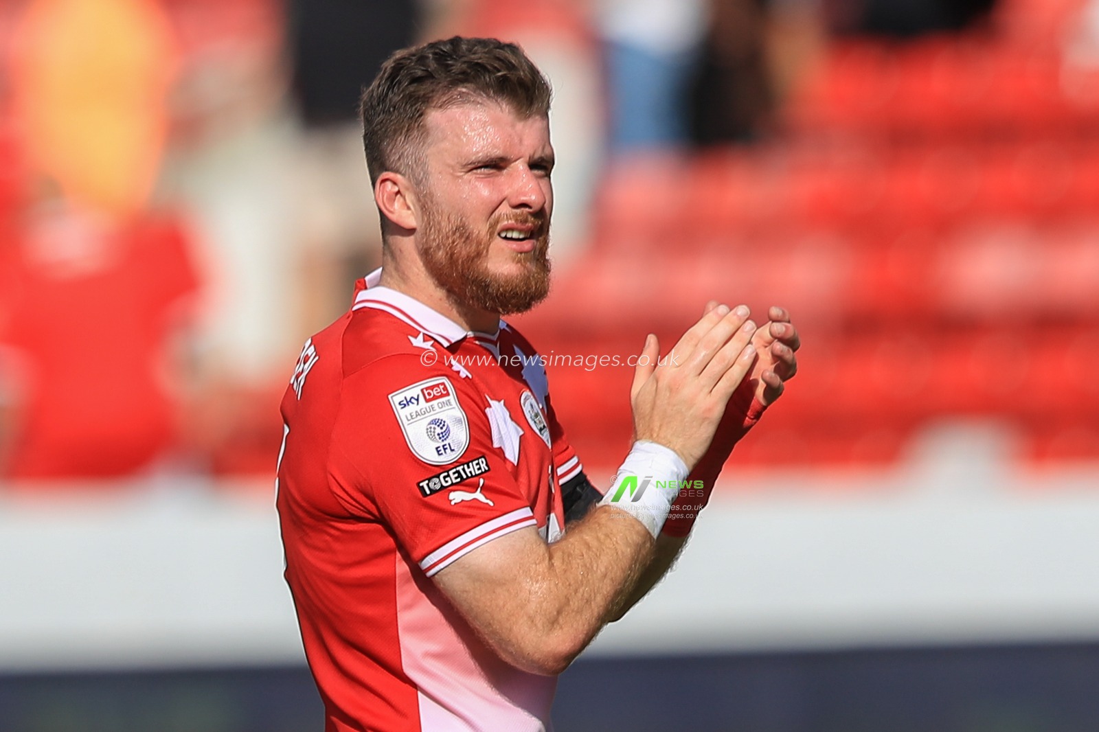 Nicky Cadden #7 of Barnsley applauds the home fans after closing 1-3 during the Sky Bet League 1 match Barnsley vs Oxford United at Oakwell, Barnsley, United Kingdom, 19th August 2023

(Photo by Alfie Cosgrove/News Images)