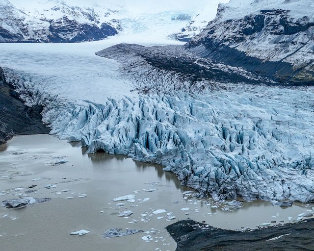 An aerial view of Skaftafell Glacier. Skaftafell Glacier, part of VatnajÃ¶kull National Park in Iceland, is a stunning natural wonder characterized by its breathtaking ice formations and rugged landscapes. Skaftafell Glacier, Skaftafell, Iceland, 25th March 2025

(Photo by Mark Cosgrove/News Images)