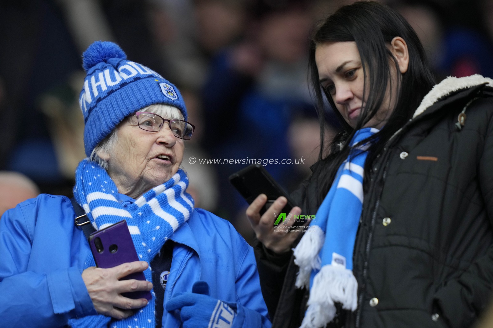 Huddersfield Town fans before the Sky Bet Championship match Wigan Athletic vs Huddersfield Town at DW Stadium, Wigan, United Kingdom, 11th February 2023

(Photo by Steve Flynn/News Images)