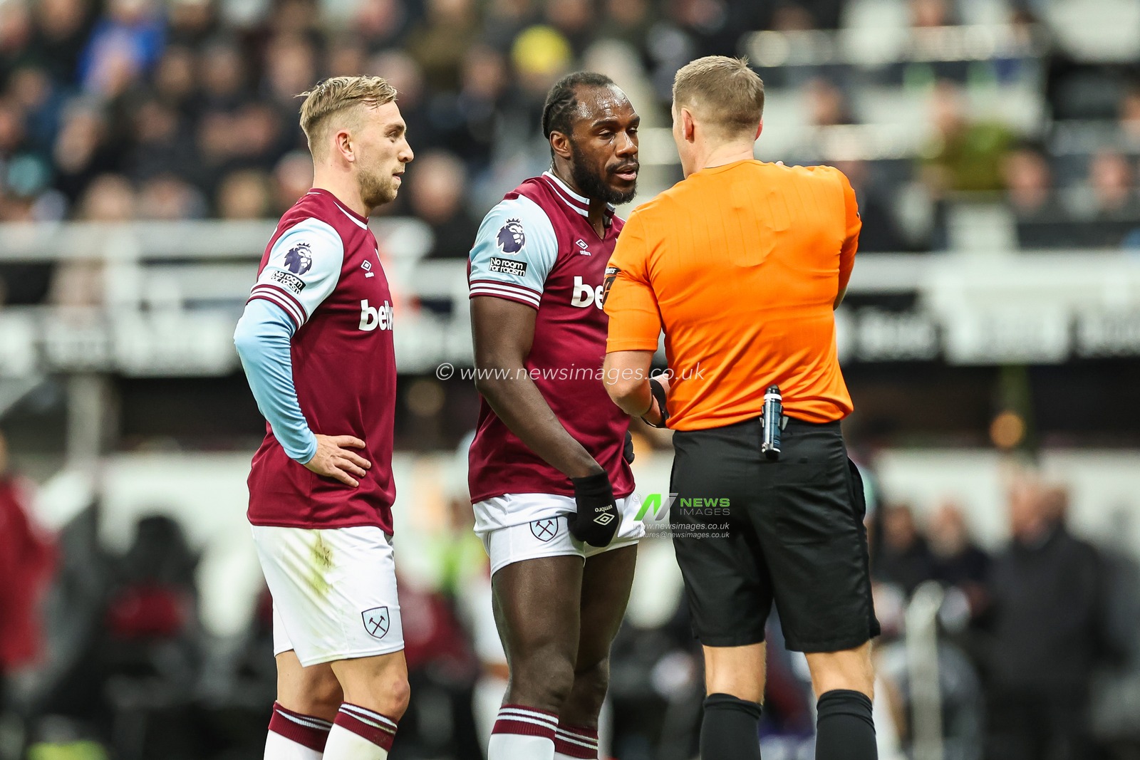 Michail Antonio of West Ham United speaks to Referee Craig Pawson in a break in play during the Premier League match Newcastle United vs West Ham United at St. James's Park, Newcastle, United Kingdom, 25th November 2024

(Photo by Mark Cosgrove/News Images)